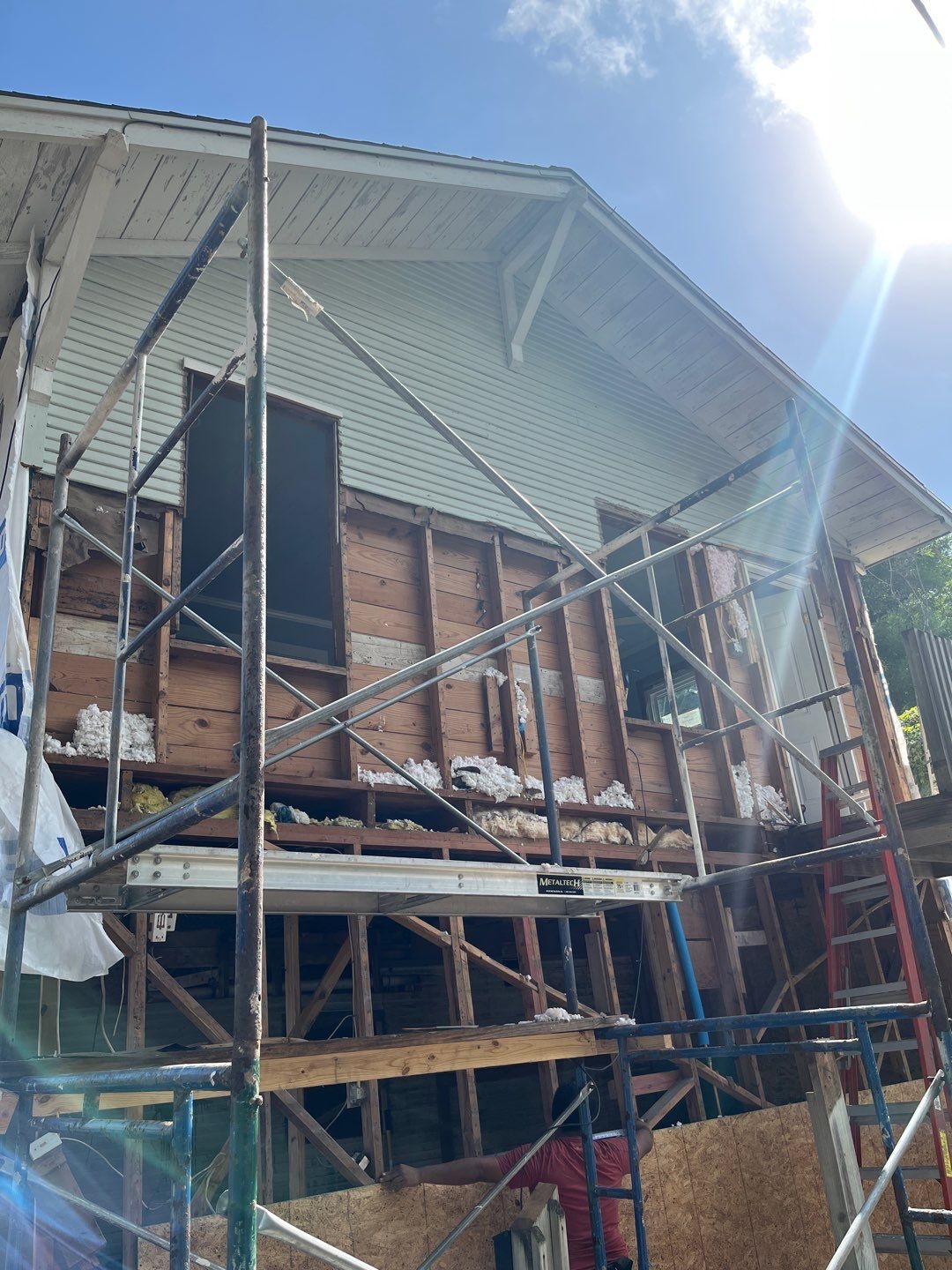 Up Town, Up Class by Bayfront Roofing and Construction