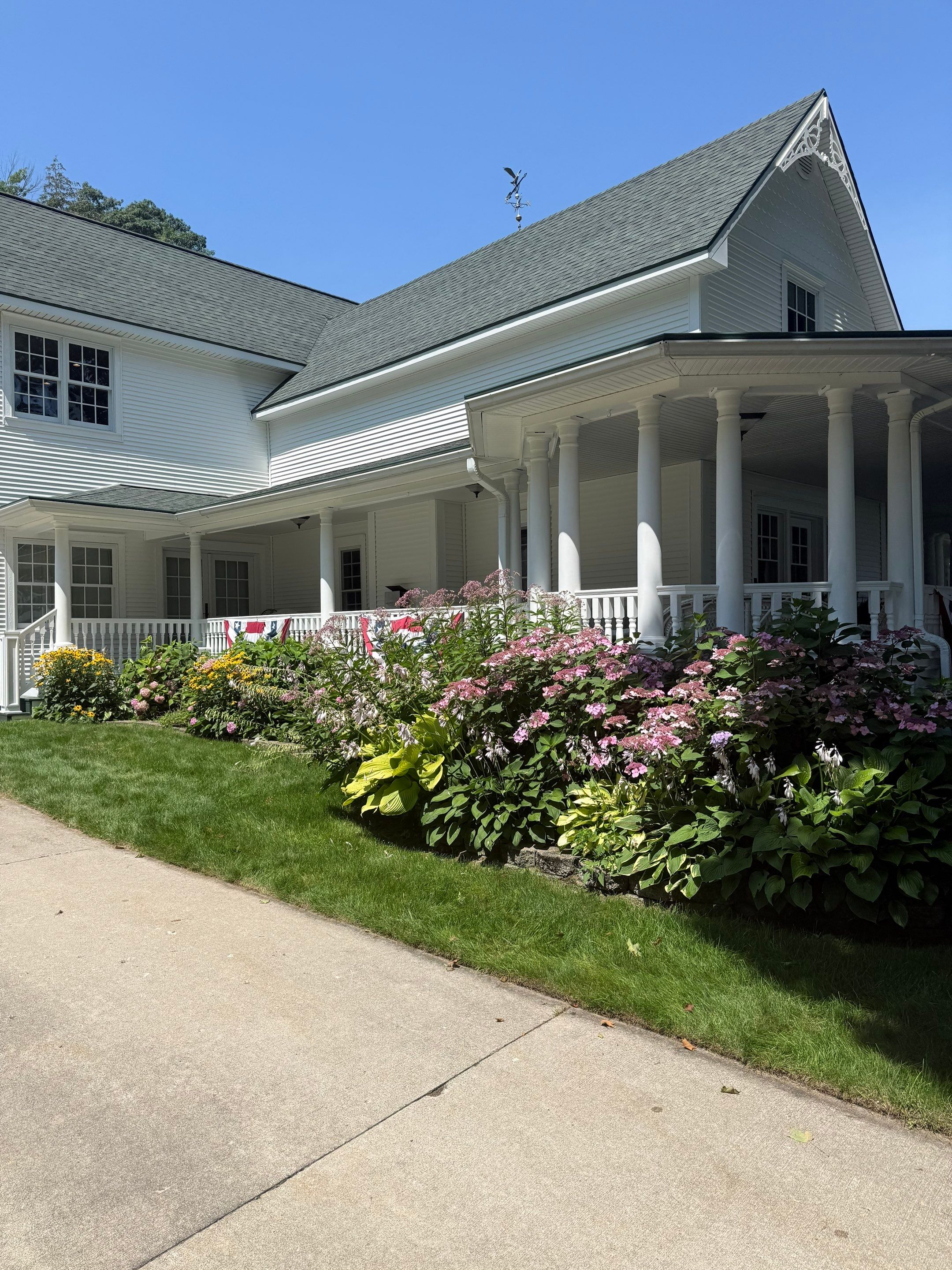 Gutter Helmet Installation for a Traverse City Residential Property by Rainbow Seamless Systems