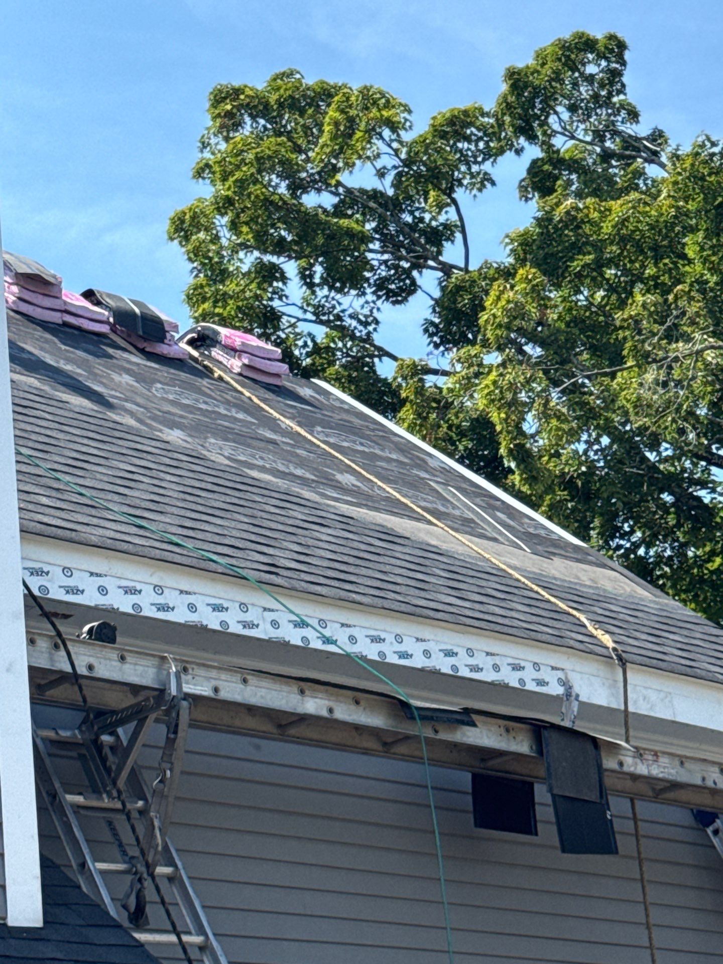 Full Roof Replacement + Custom Gutter Install | Onyx Black Finish by Mighty Dog Roofing of Greater Middlesex County
