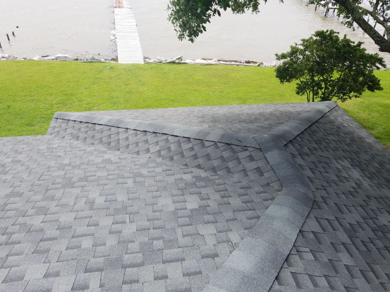 Residential Roofing Installation using Roof Replacement by American Roofing & Construction LLC