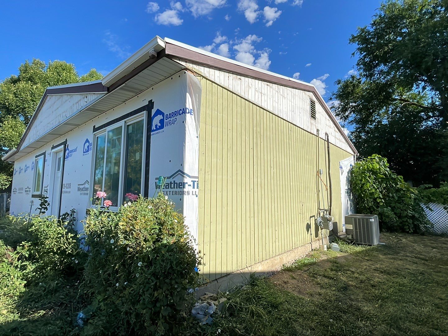 A little bit goes a long way. by Weather-Tite Exteriors LLC