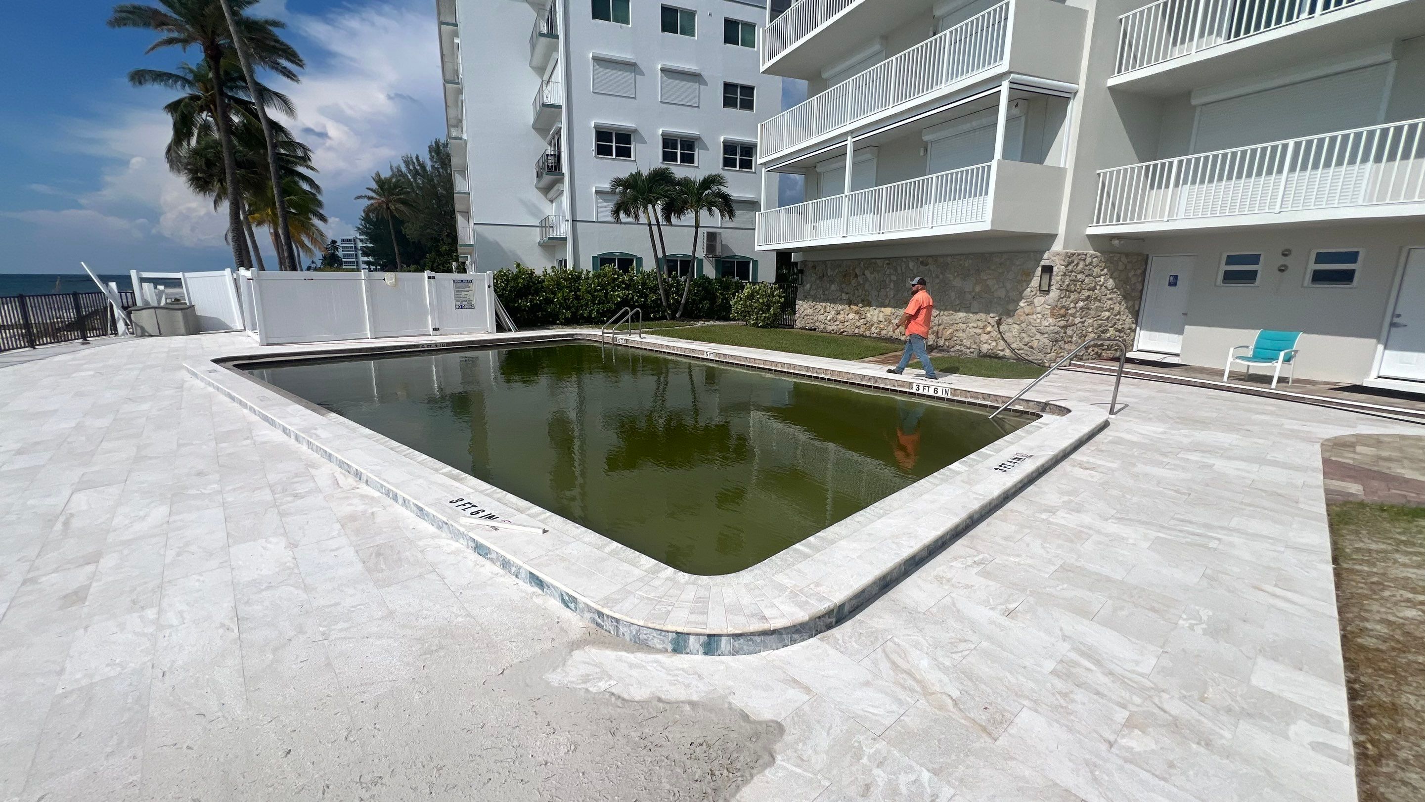 Naples Condo Pool Cleanout by APS Power & Water
