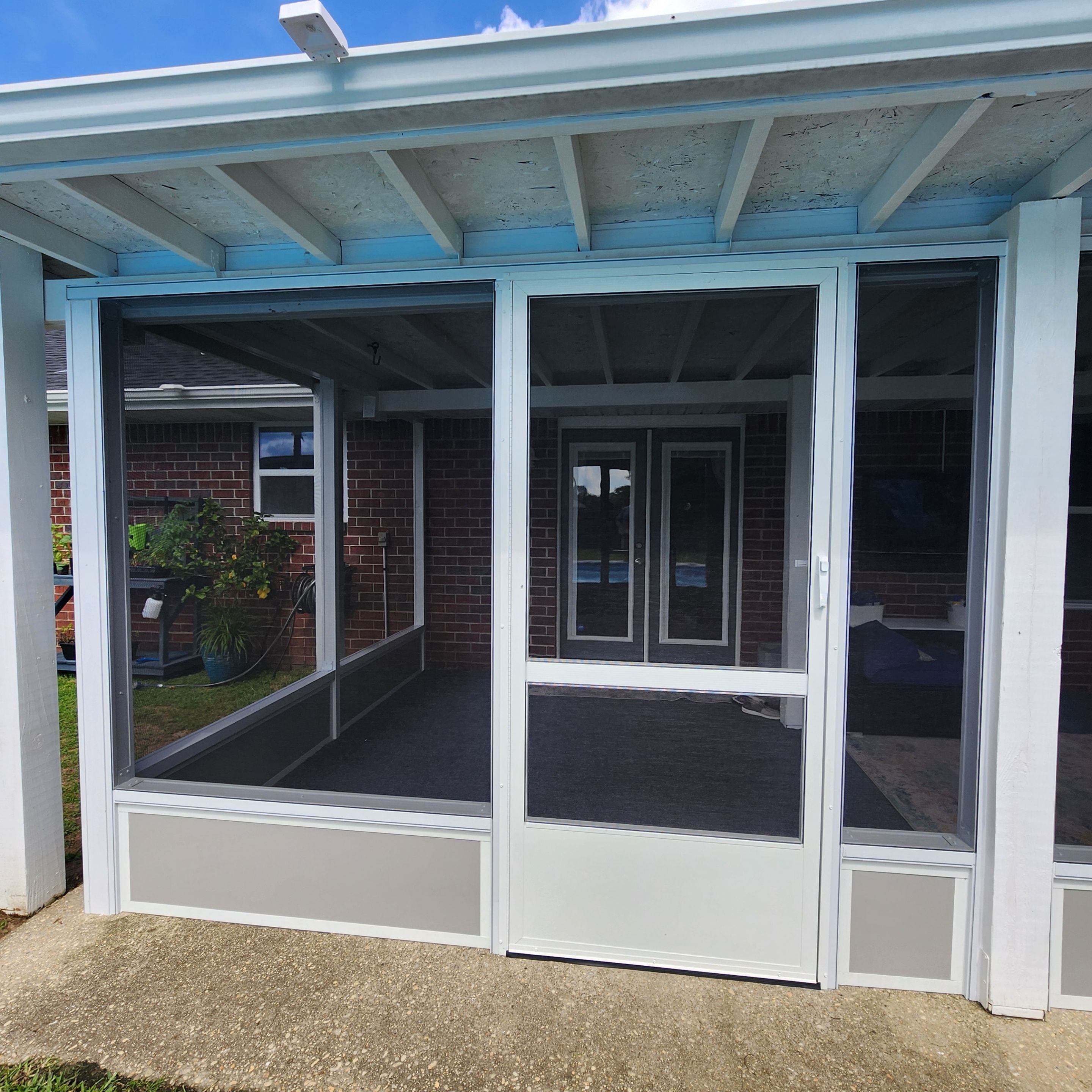 Screen Room Built Under Existing Roof by Titan Sunrooms