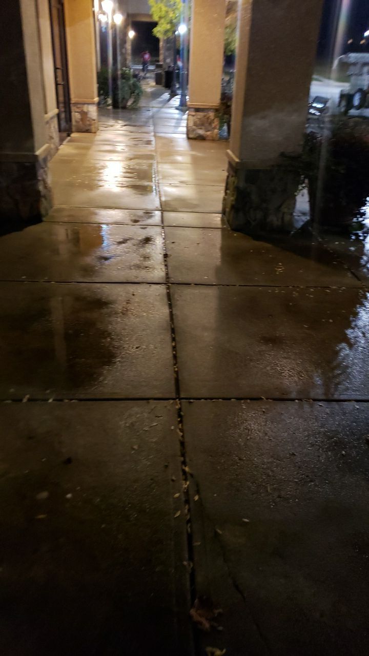 contrete cleaning using cleaner by Power Wash Masters LLC