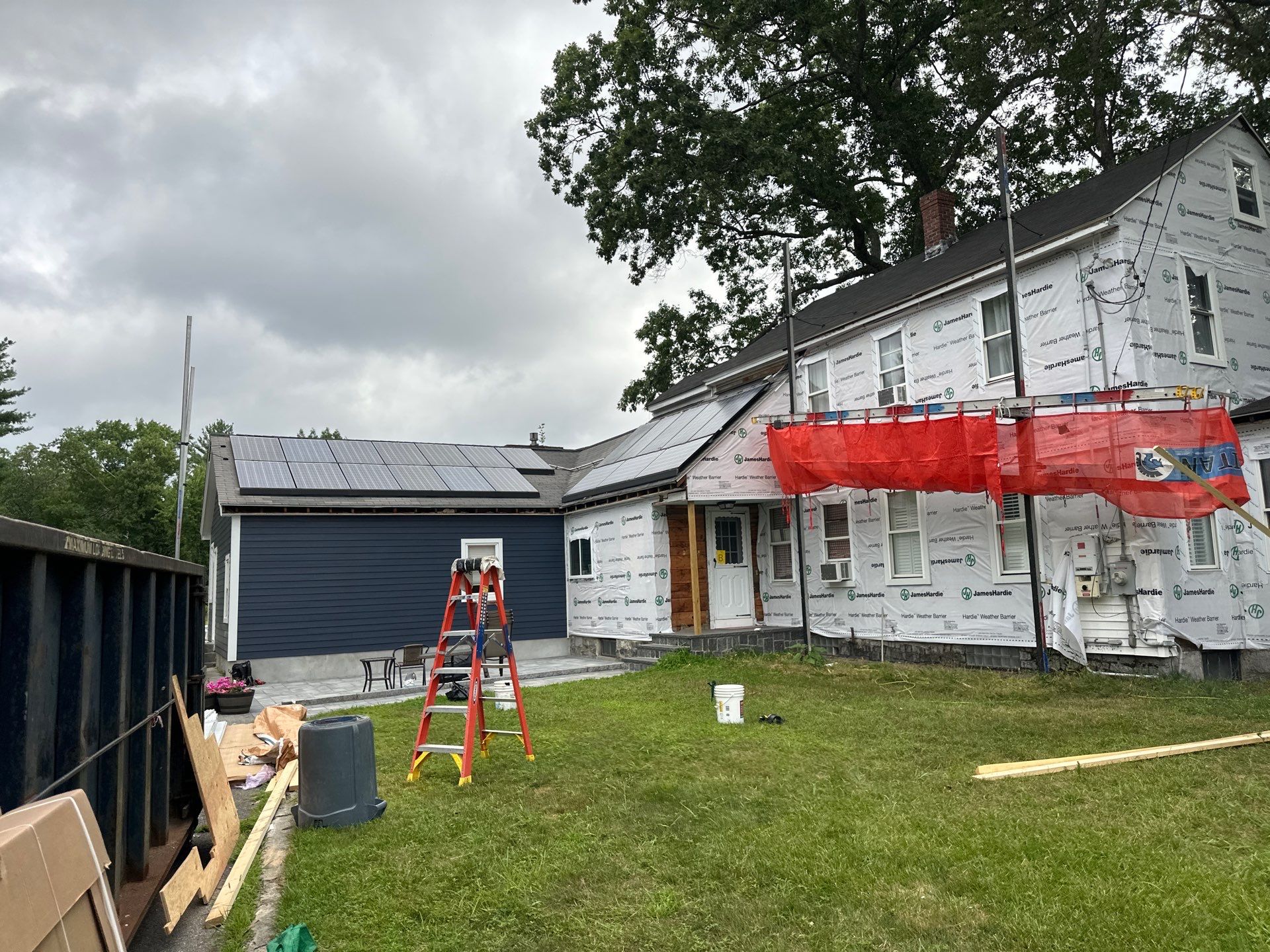 James Hardie Lap Siding Installation in Chelmsford, MA by Mighty Dog Roofing of Greater Middlesex County
