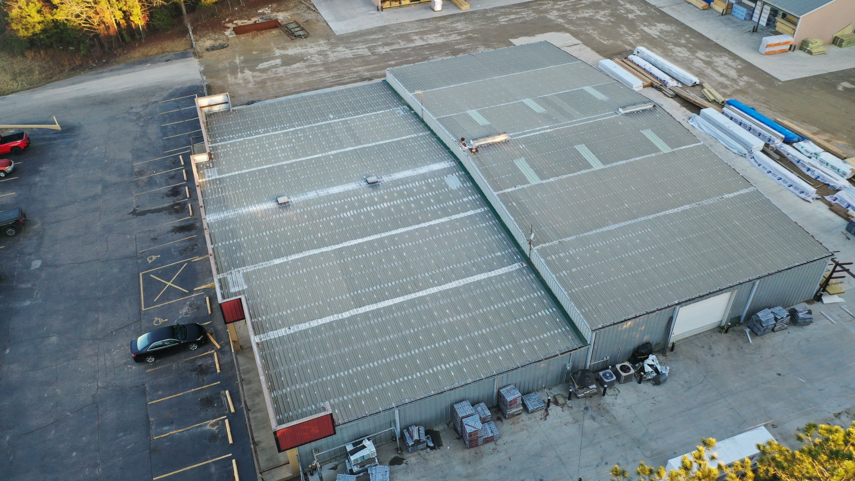 Commercial Roofing Installation using Aldocoat Coatings by Hostetler Roofing