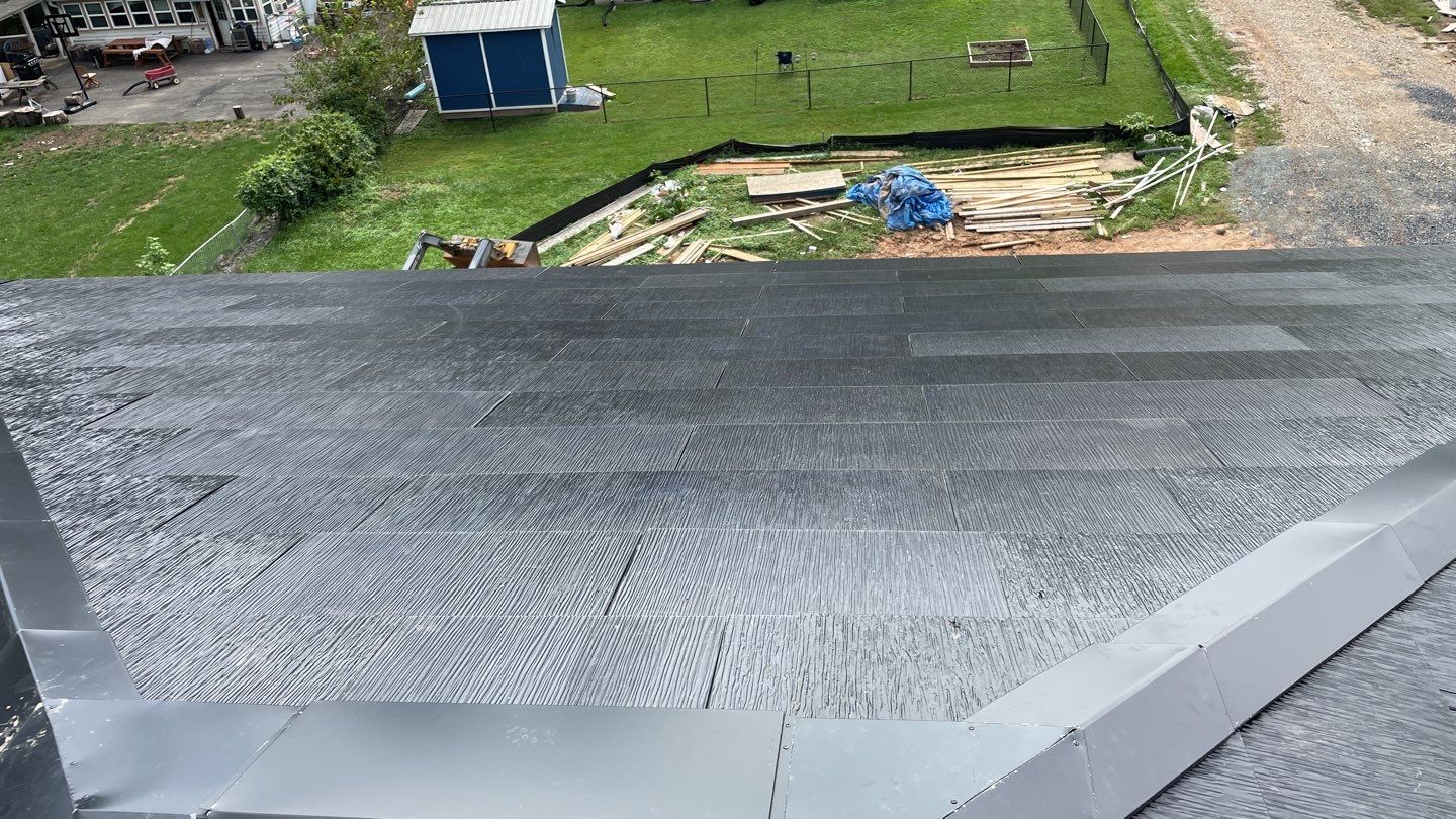 Tesla Solar Roof  using Tesla Solar Roof V3 tiles by American Home Contractors