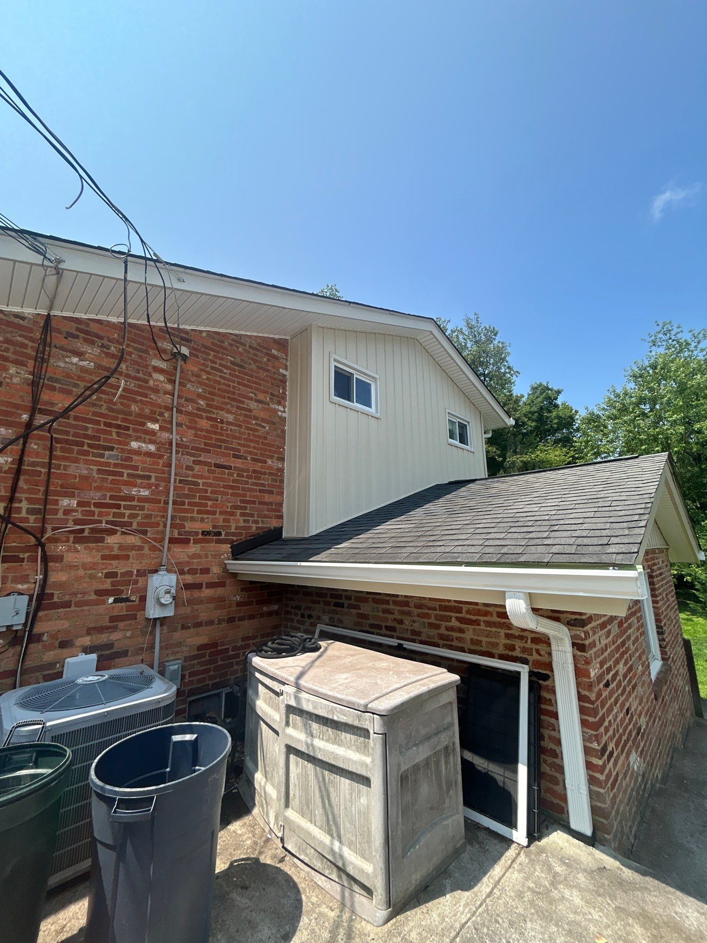Fairfax: Residential Siding Replacement with CertainTeed 8" Board and Batten Siding in Desert Tan by RM Banning, Inc.