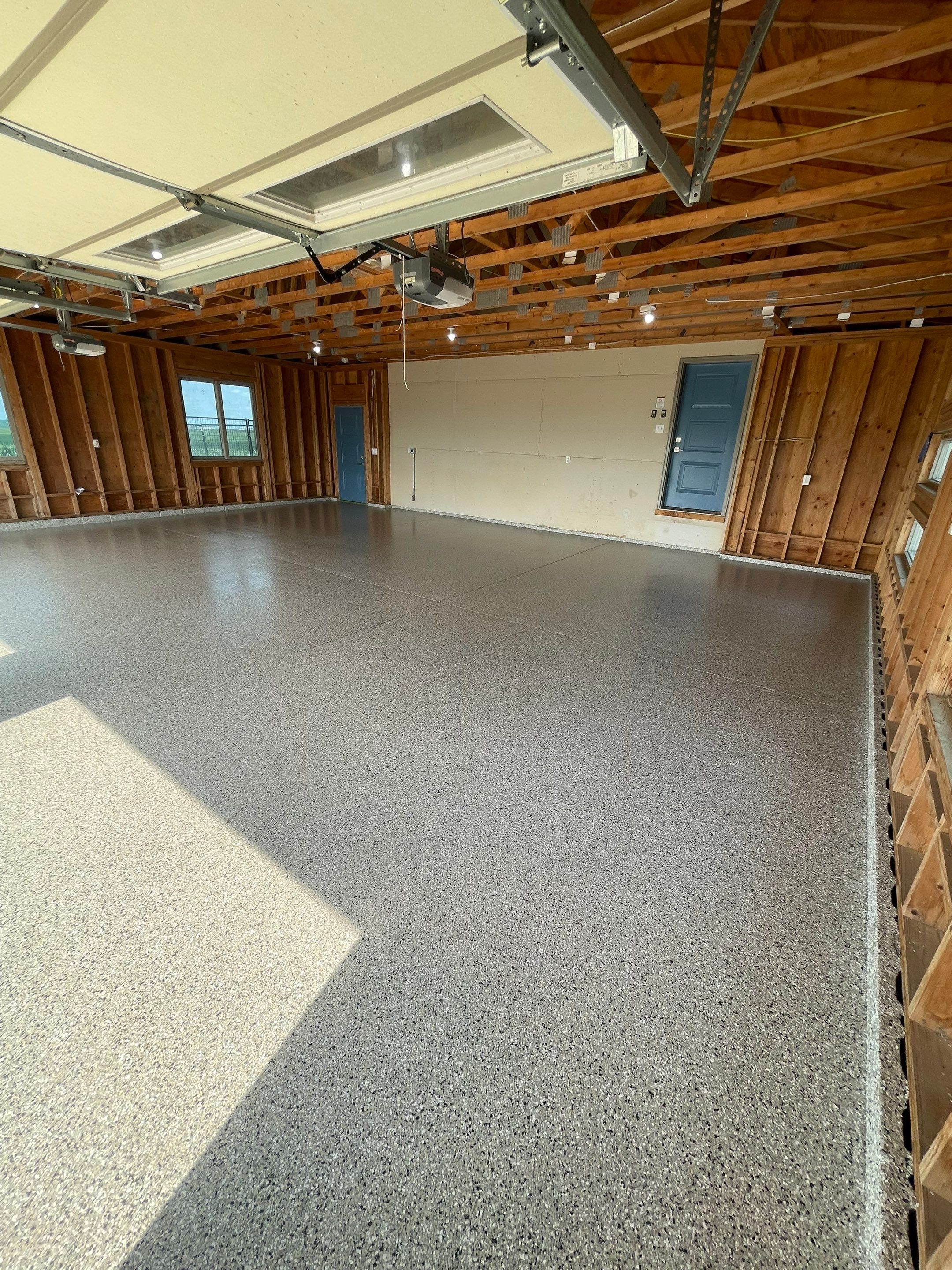 Cabin Fever Coating for Detached Garage in Dell Rapids by Select Painting, Coatings & Garage Cabinets