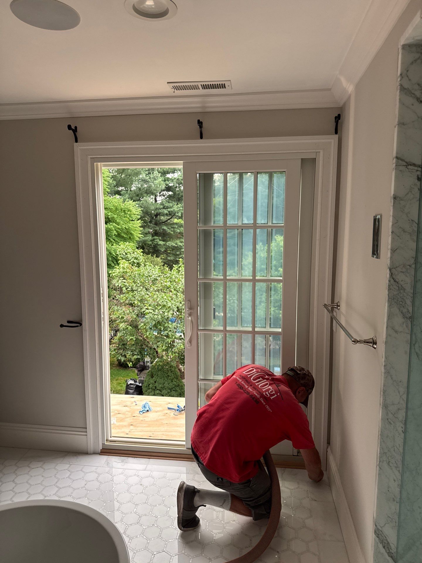 Patio Door Installation Using Infinity by Marvin Patio Door by DiGiorgi Roofing and Siding Inc