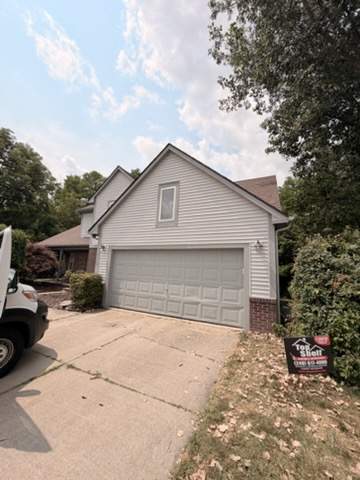 Exterior Siding and Wood Trim Restoration in Ypsilanti by Top Shelf Painter