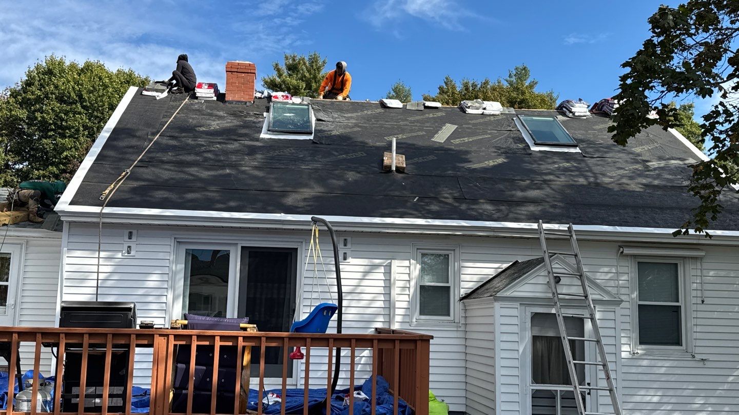 Complete Roof Replacement with GAF Pewter Gray HDZ™ Shingles, VELUX Skylights & New Gutters by Sensible Home Solutions
