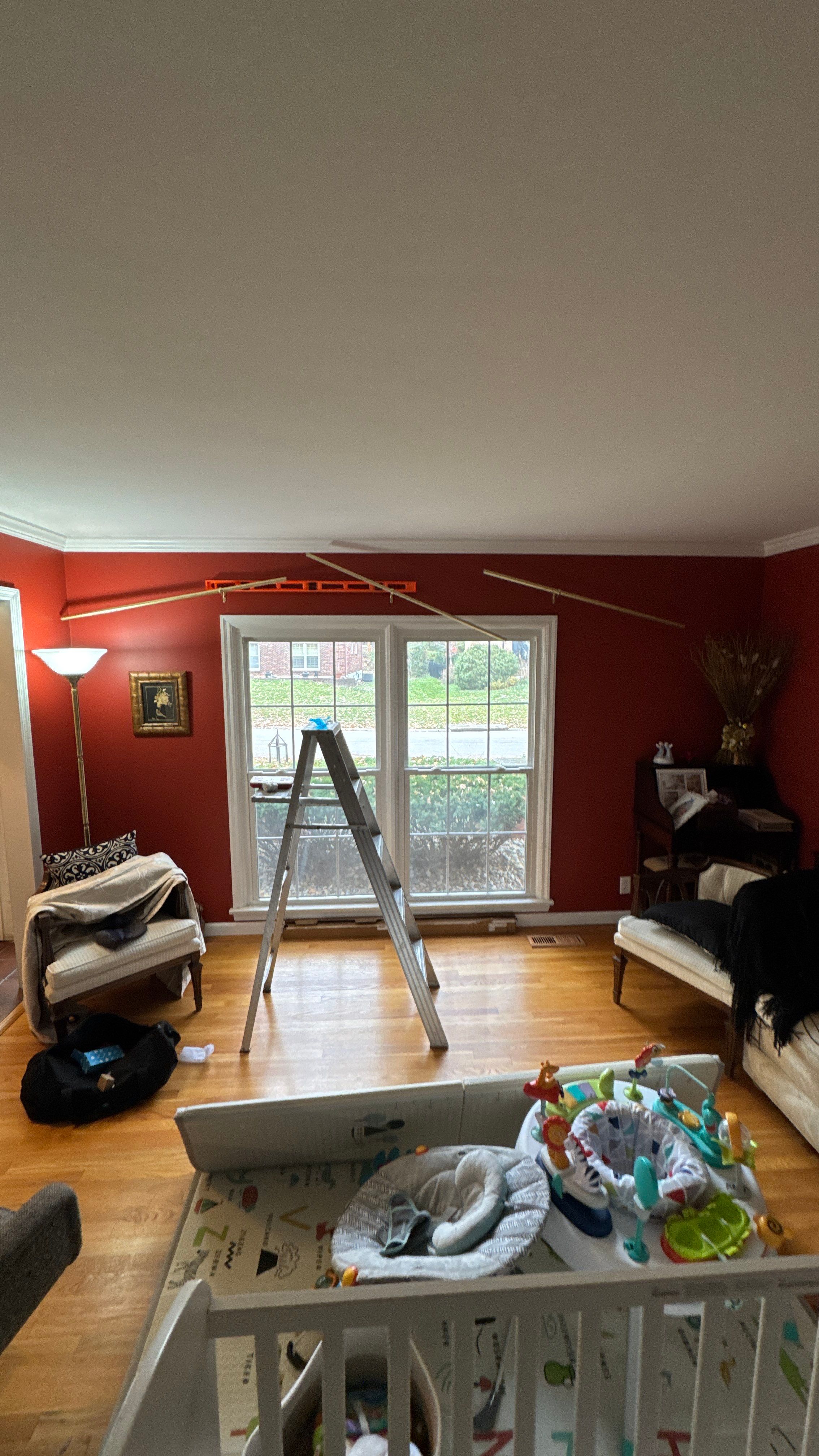 Handyman Project - Hanging Curtain Rods by Legendary Services Company LLC.