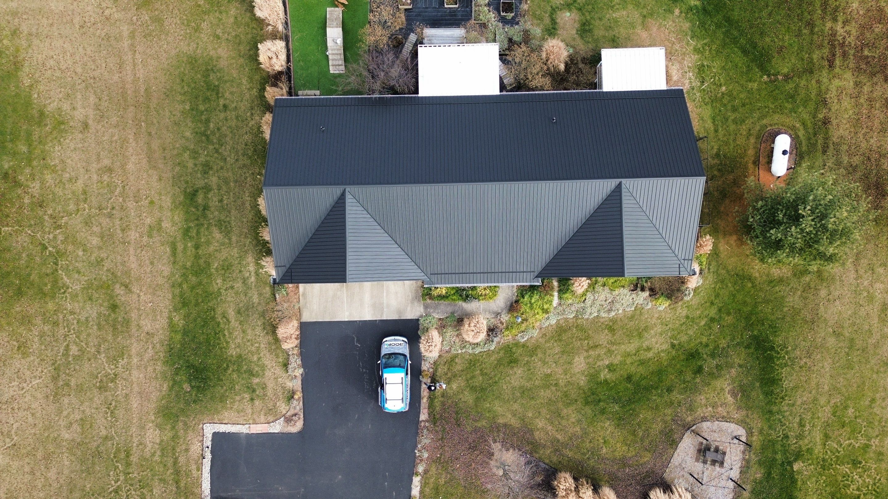 Residential Roofing Installation using Performance Panel Metal - Frost Black by RoofX 