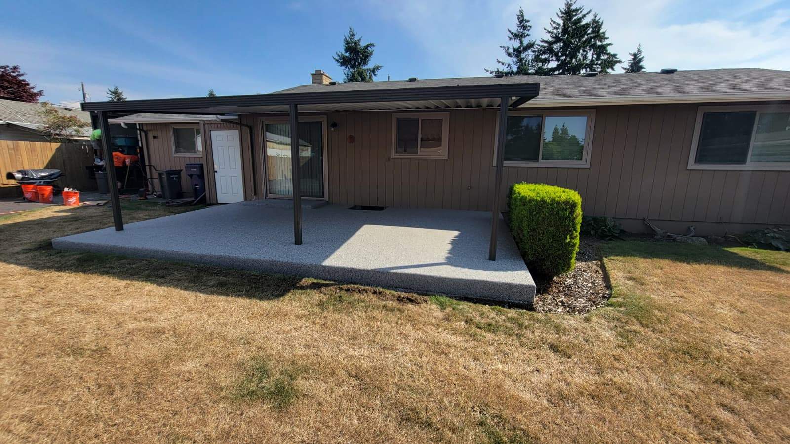 Coastal Elegance Patio in PoseidonVuba Stone by Concrete Coating Experts Inc.