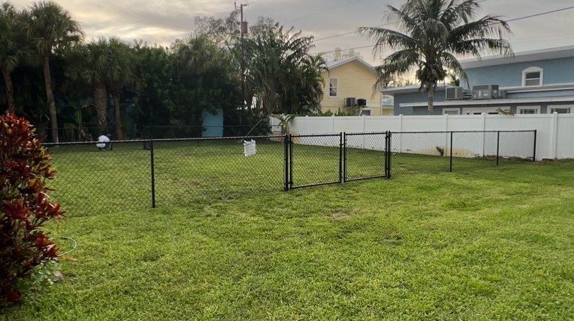 Holmes Beach, FL 4ft. Tall Black Chain-link  by Asap fence and gates, LLC