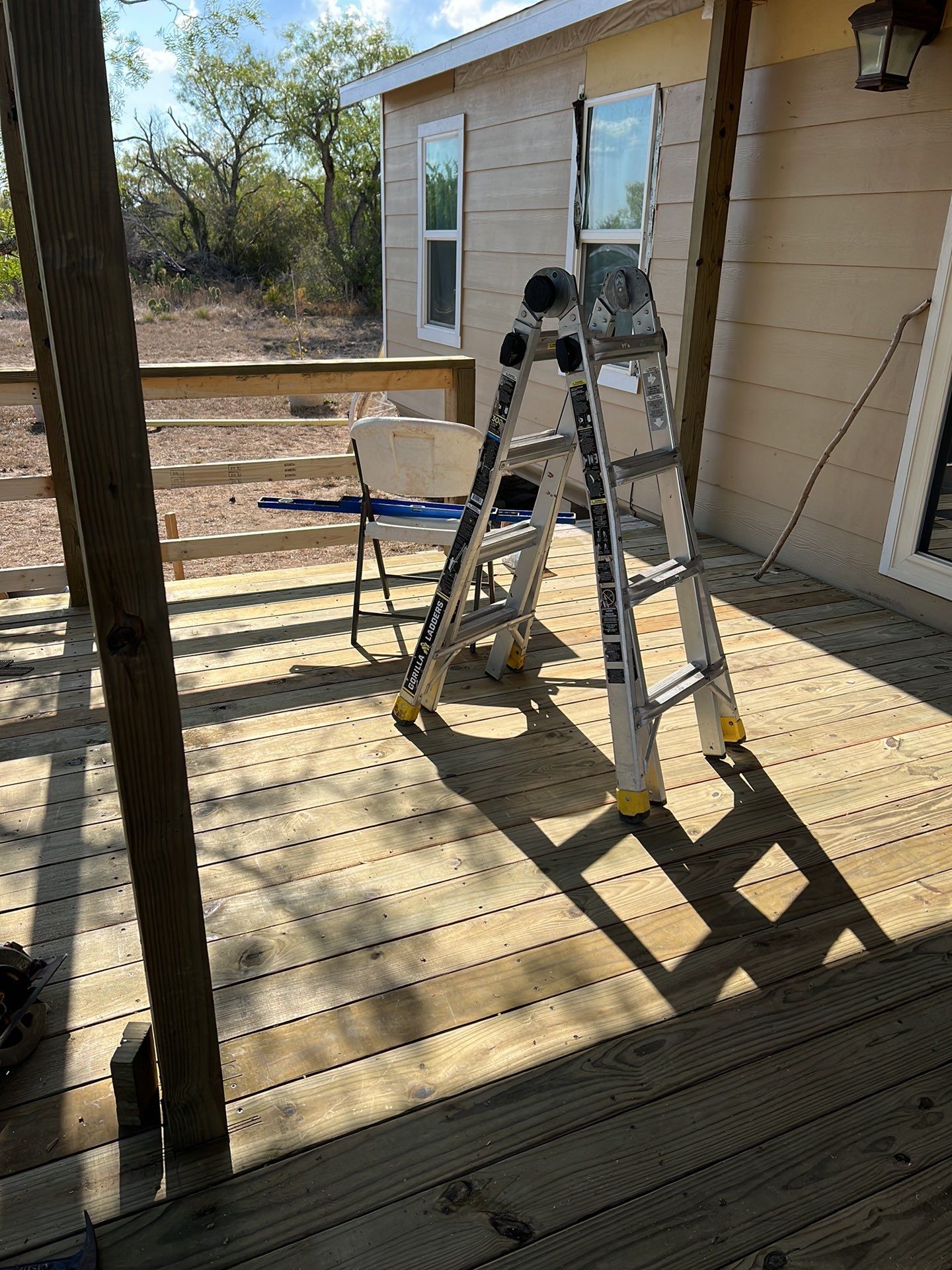 Front Porch Sitt'n by Bayfront Roofing and Construction