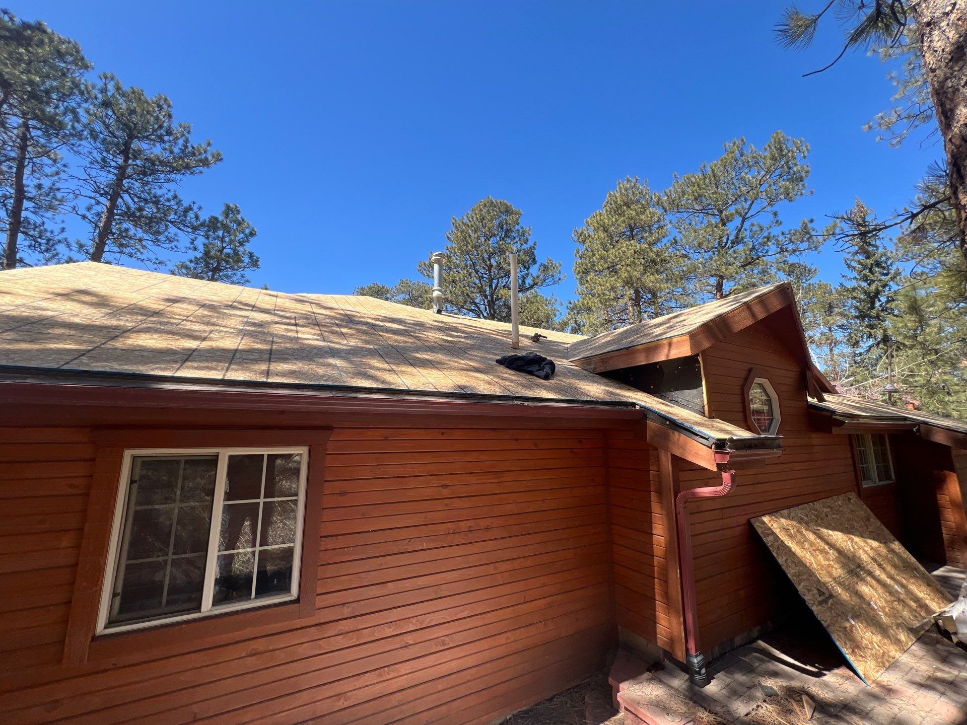 Residential Roofing Installation using Standing Seam Metal by Blue Peaks Roofing LLC 