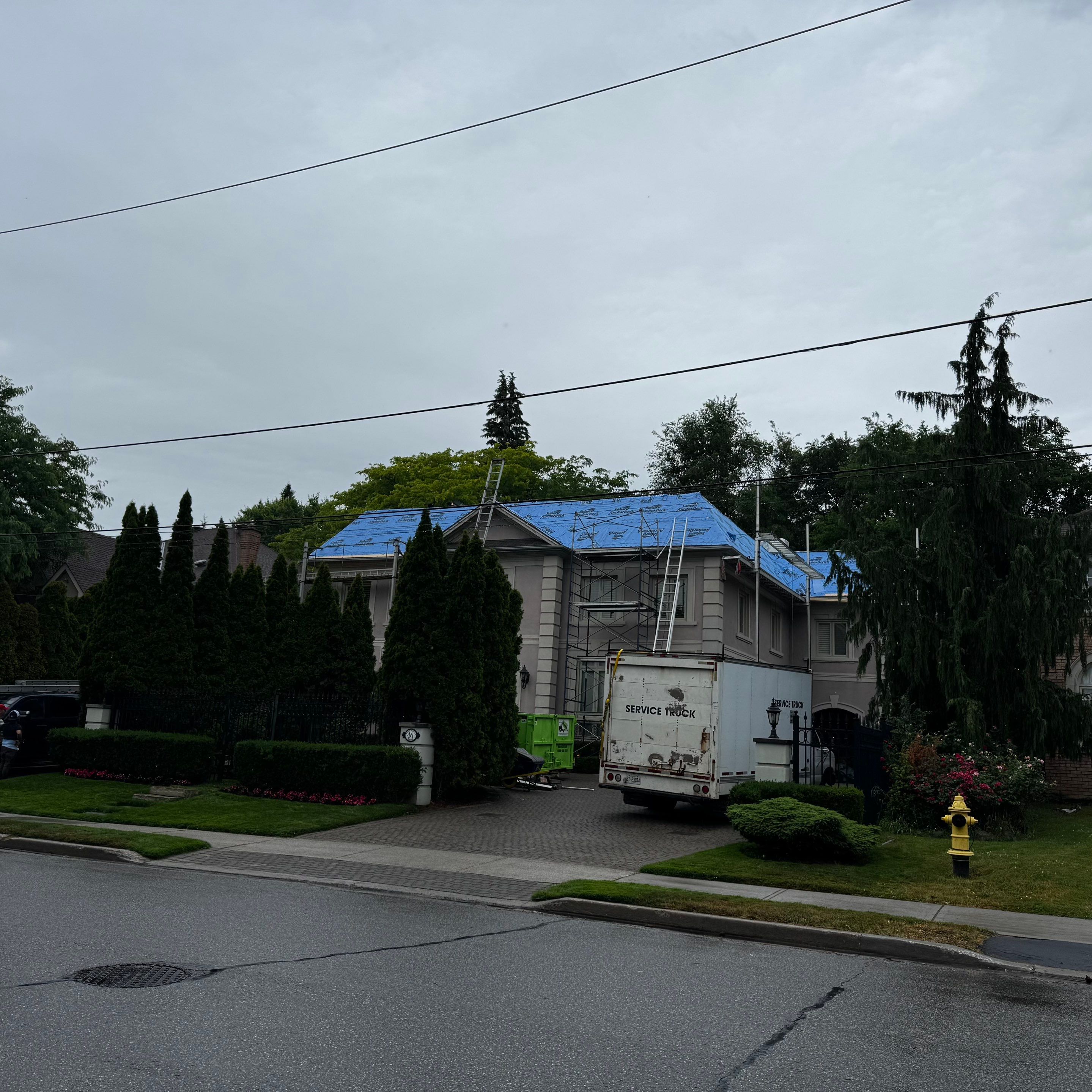 Residential Roofing Installation using Vicwest True Natuer. Metal Shingle by Jay Carter Roofing & Sheet Metal