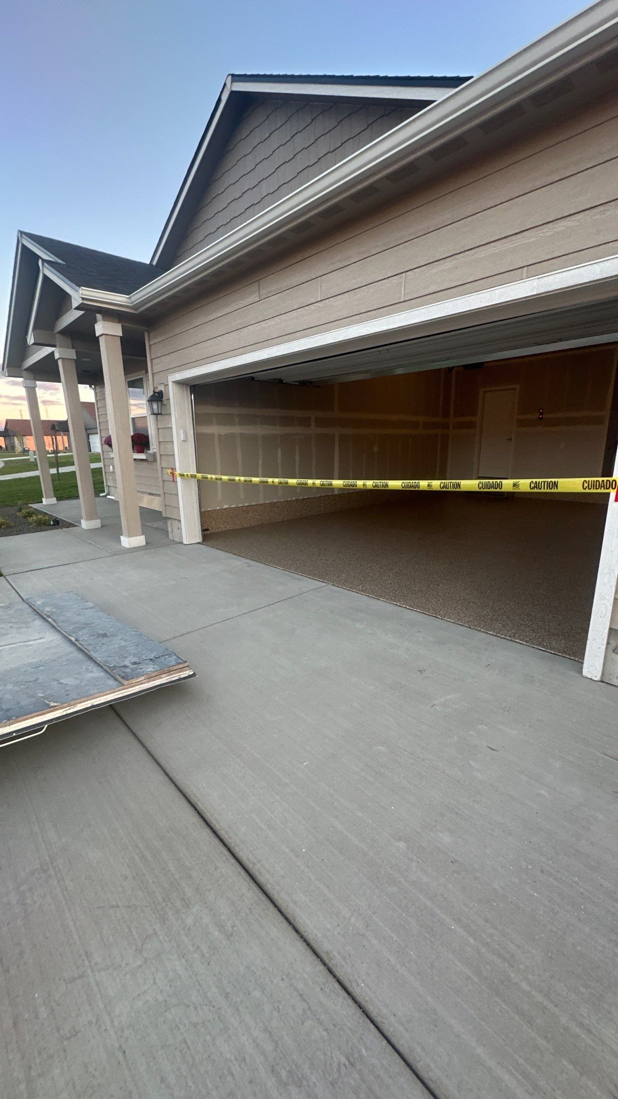 Garage Transformation using Sandstone by Croc Coatings, LLC