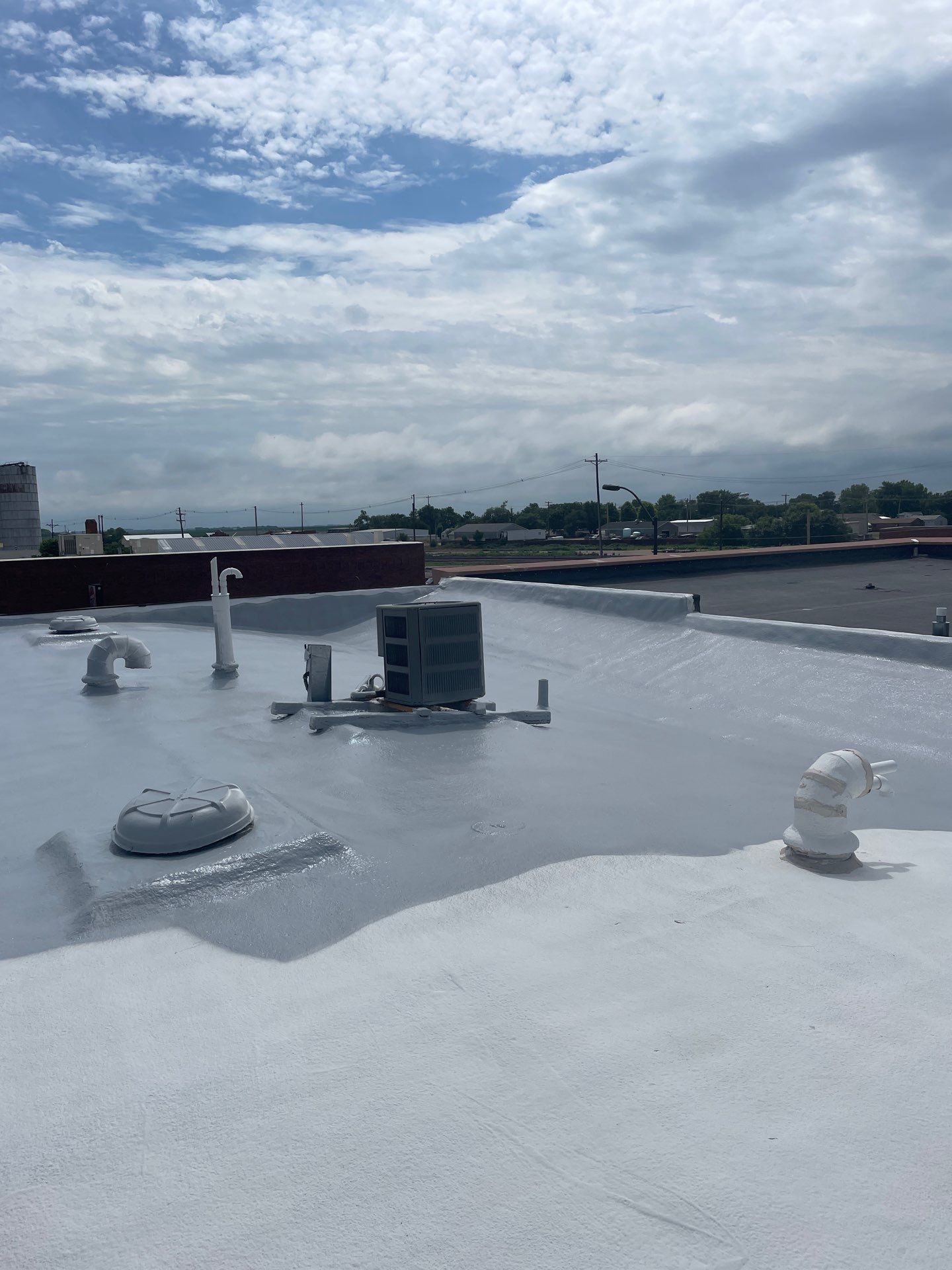 Roof Coating - South Central Area Recovery - Holdrege, Nebraska by Tillotson Enterprises