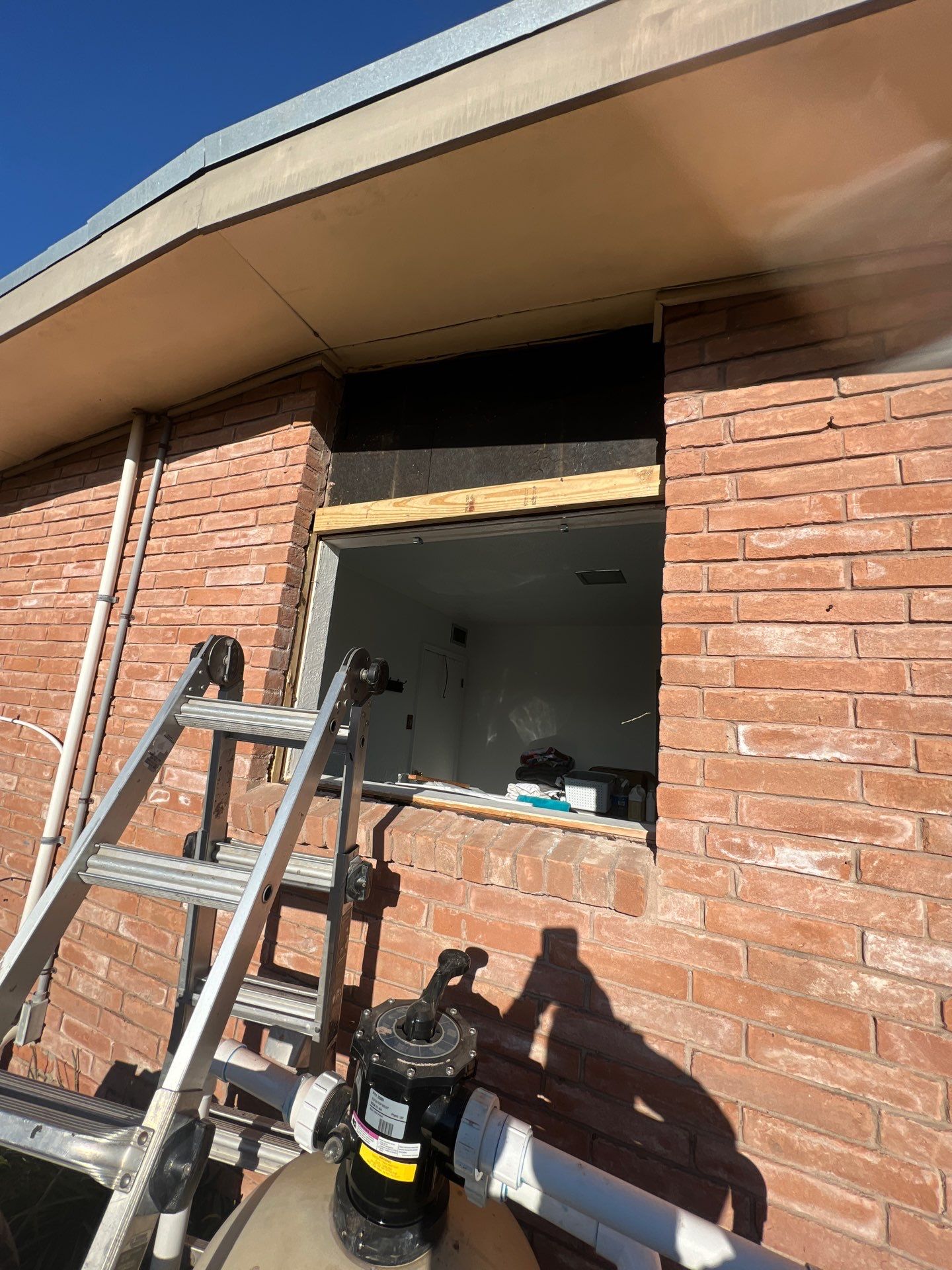 Windows in Brick with a Bay Window by Bayfront Roofing and Construction