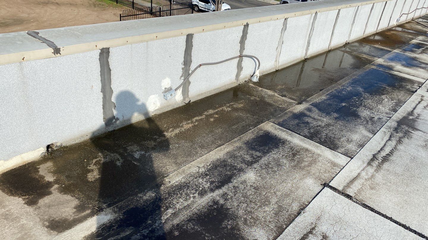 Spray foam and coatings using Conklin Benchmark/PUMA XL coatings and spray foam by Straight Edge Roofing Inc