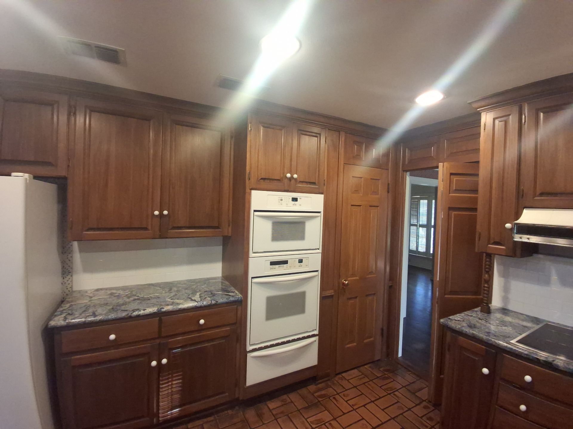 A Brilliant Cabinet Transformation | Tyler TX Quality Coats Painting by Quality Coats Painting
