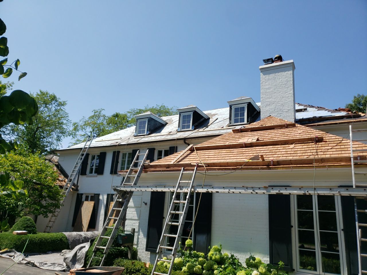 Cedar Shake Roof Replacement with Half Round Copper Gutter Installation  by Custom Installations
