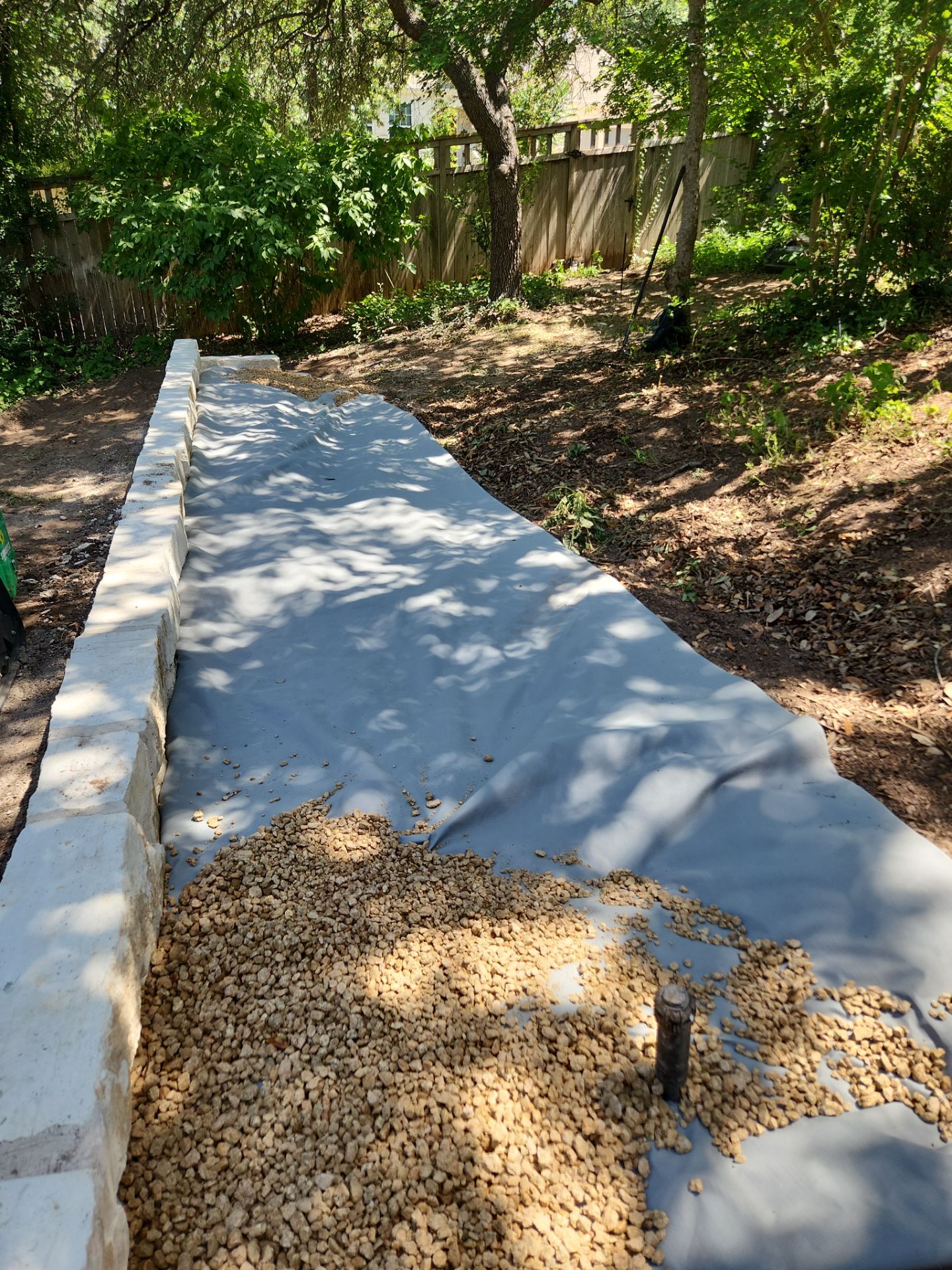 Retaining Wall and Backyard Drainage Installation in Northwest Hills Austin by RejuveNate Renovations LLC