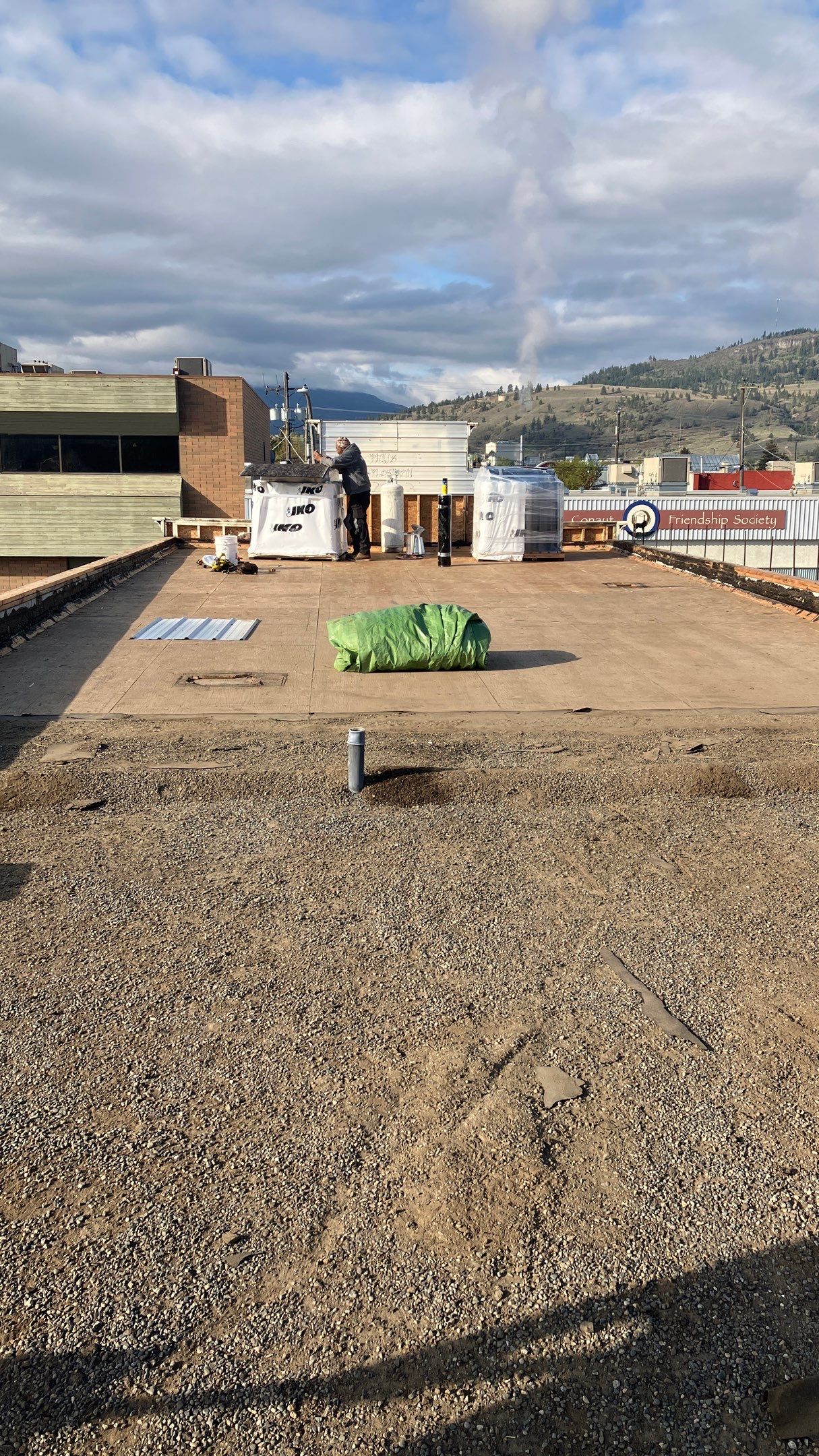 Commercial ReRoofing Installation using IKO 2ply sbs by Top Notch Roofing Inc