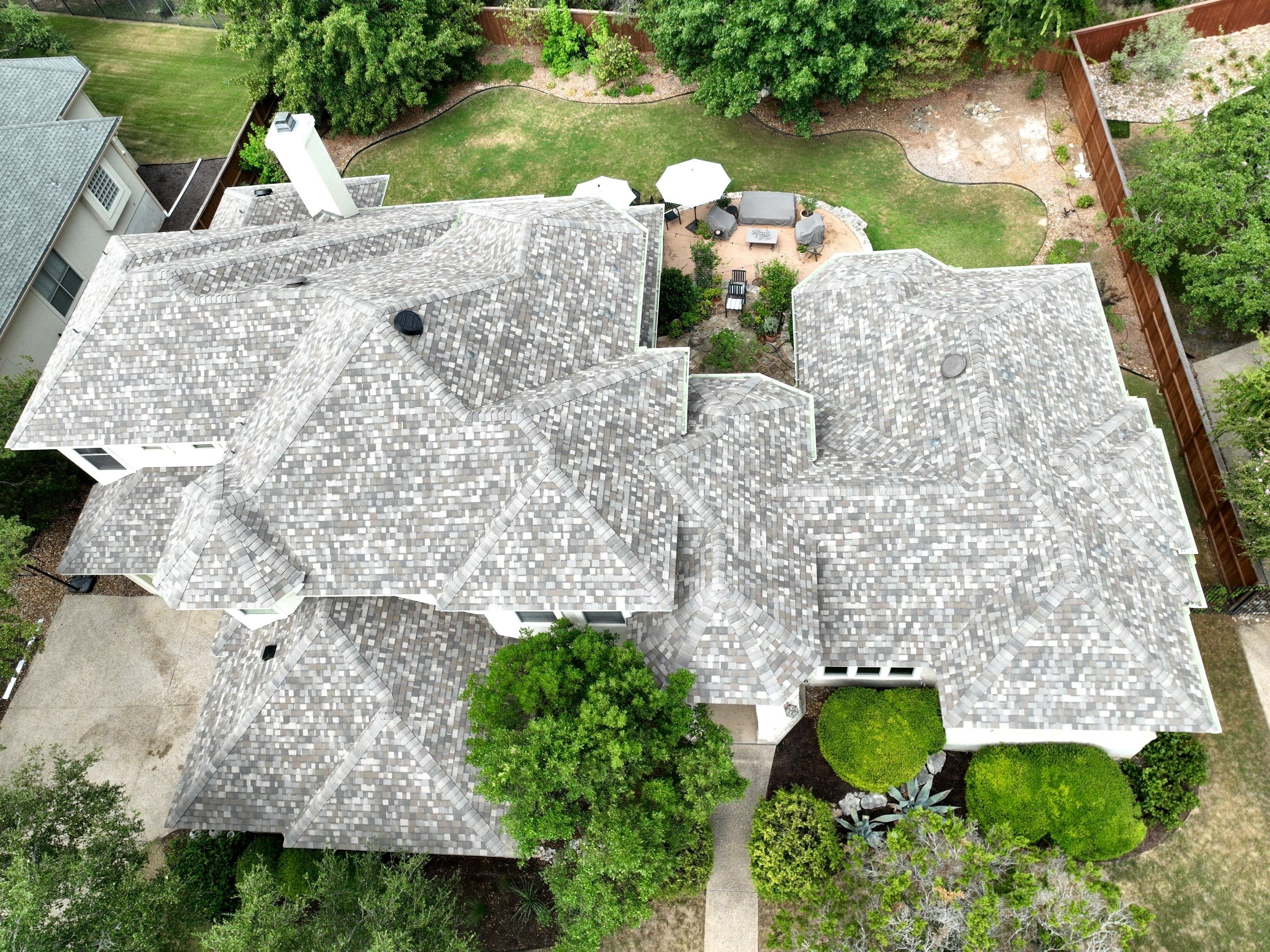 Residential Roof Replacement using 30 Year Laminate Shingles with High Profile Ridge by Premier Roofing and Contracting