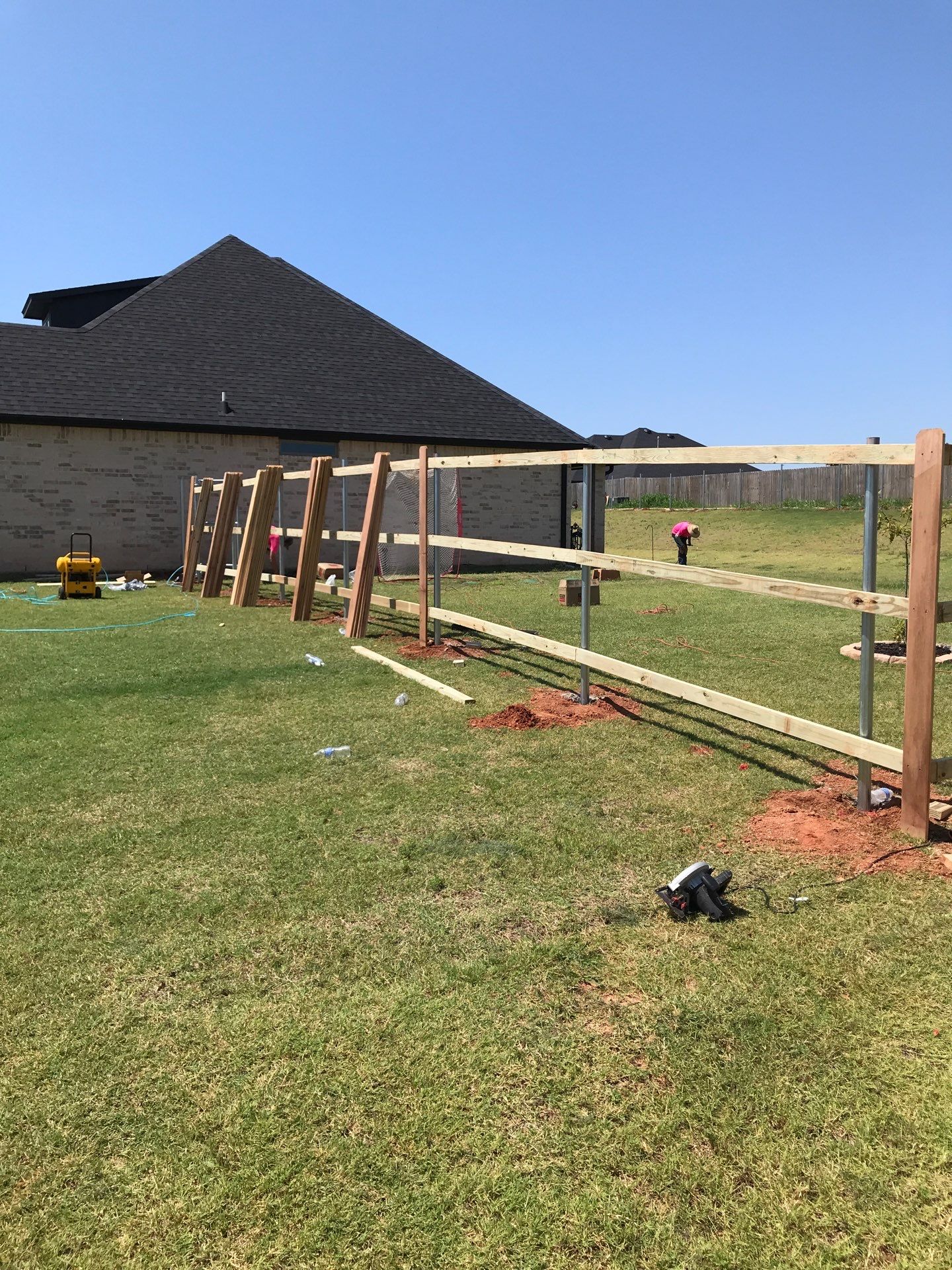 Cedar Fence using Metal Poles by Clays Services Inc
