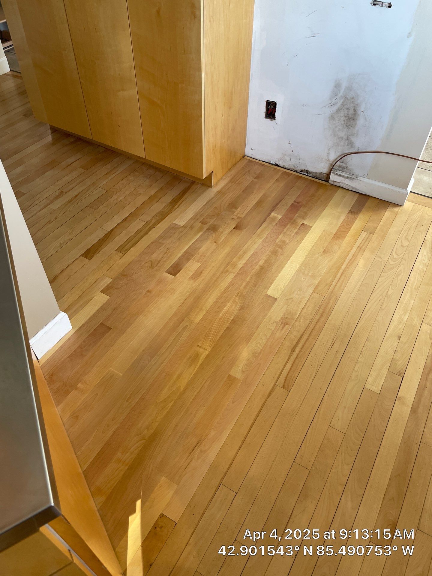 Water Damage Restoration On Solid Birch by RTBaldwin Hardwood Floors