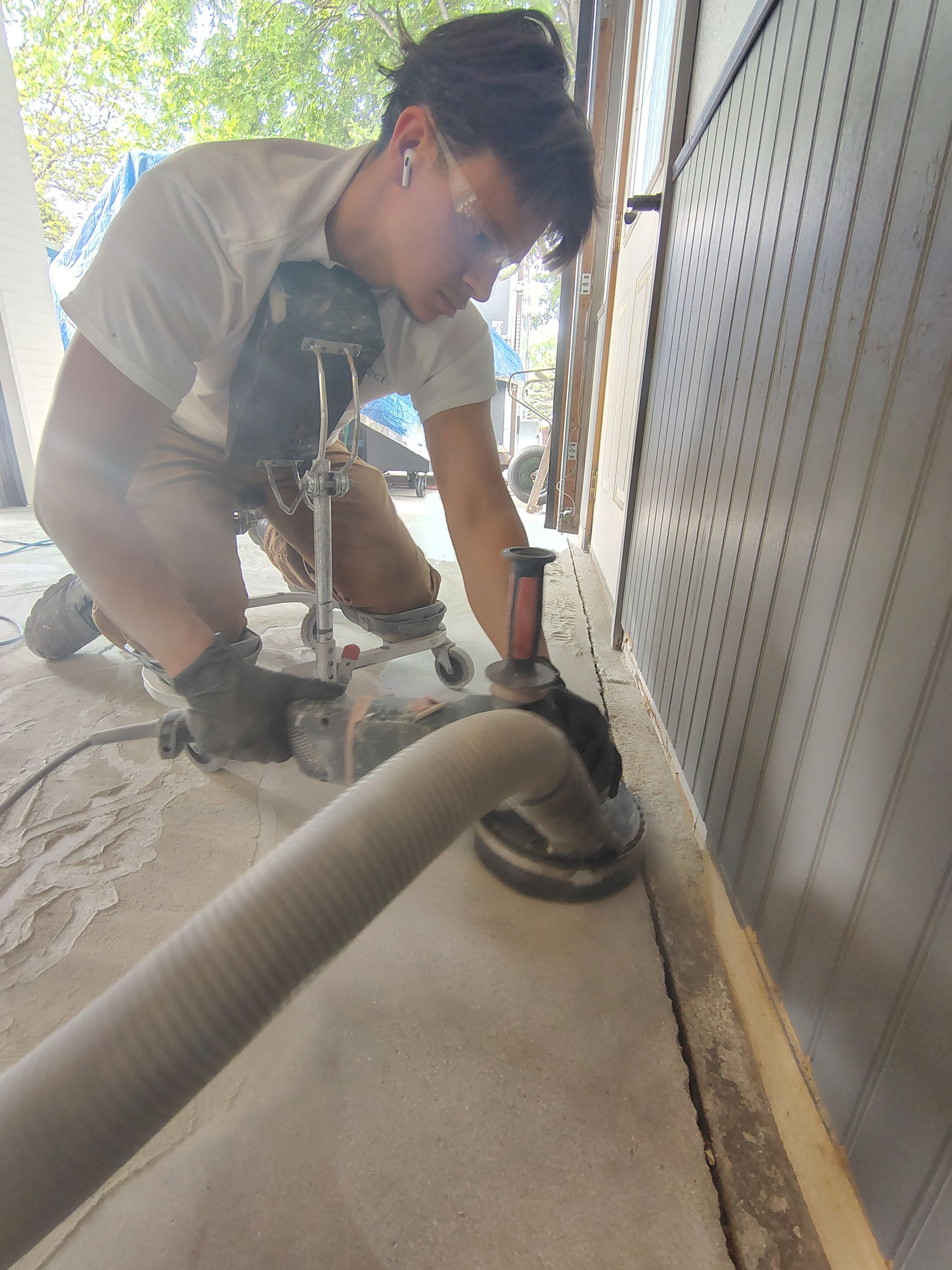 Multi-Fleck Epoxy Garage Floor Coating in Dell Rapids by Select Painting, Coatings & Garage Cabinets