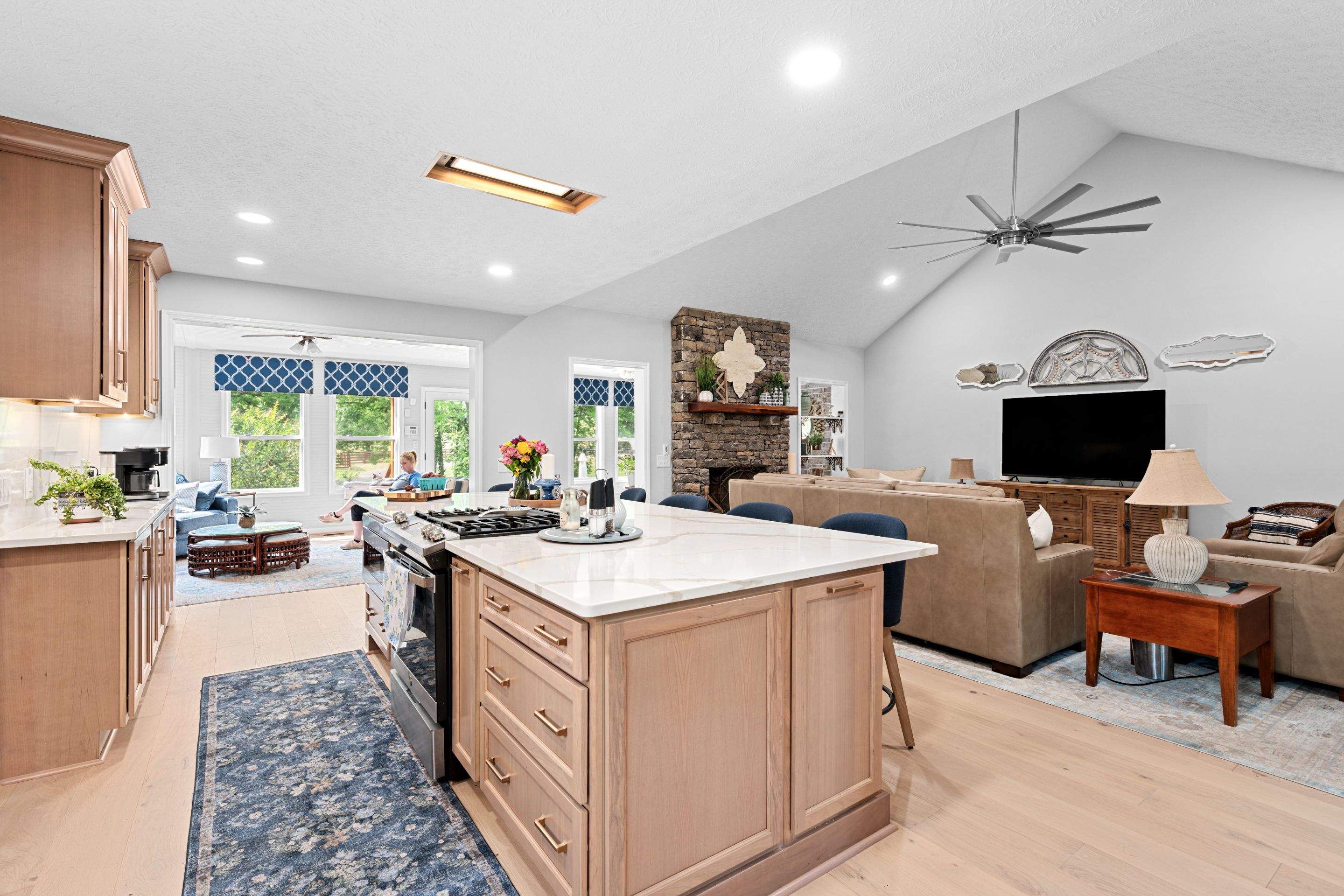Modern Kitchen Remodel Featuring Quartz Backsplash, under cabinet lighintg, and a coffee bar in Mt. Juliet Tennessee by DeRo Renovations,LLC