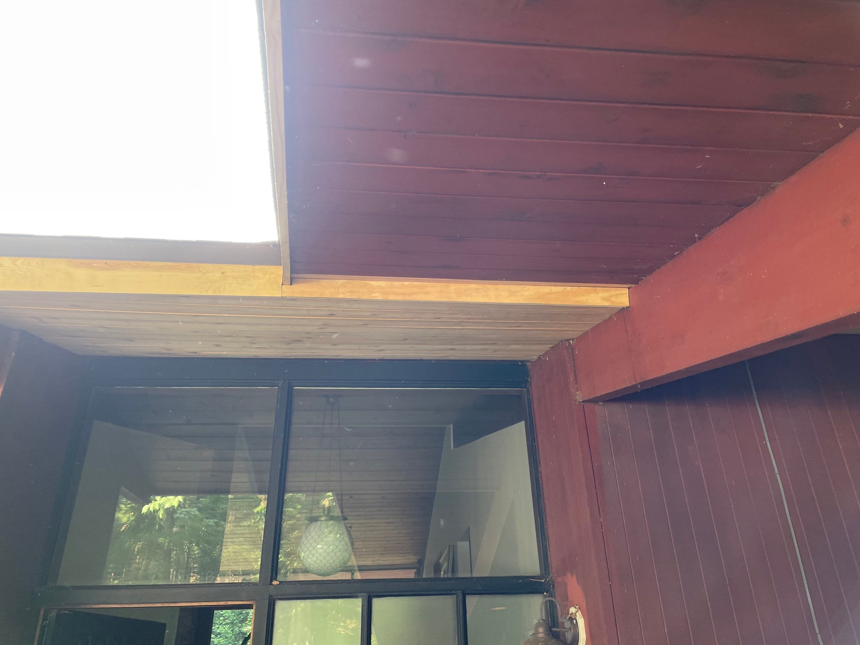Deckhouse Roof Replacement by American Home Contractors