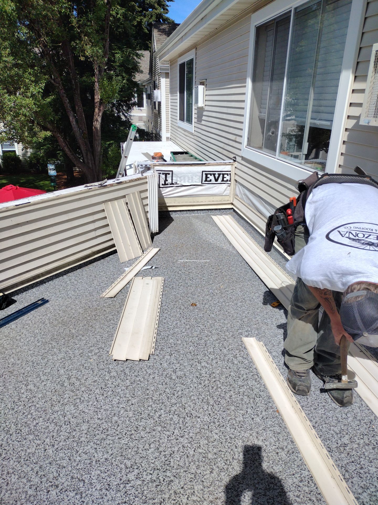 Dec-Tec Walkable Membrane using Dec-Tec (Color: Granite) by Orezona Building & Roofing Company, Inc.