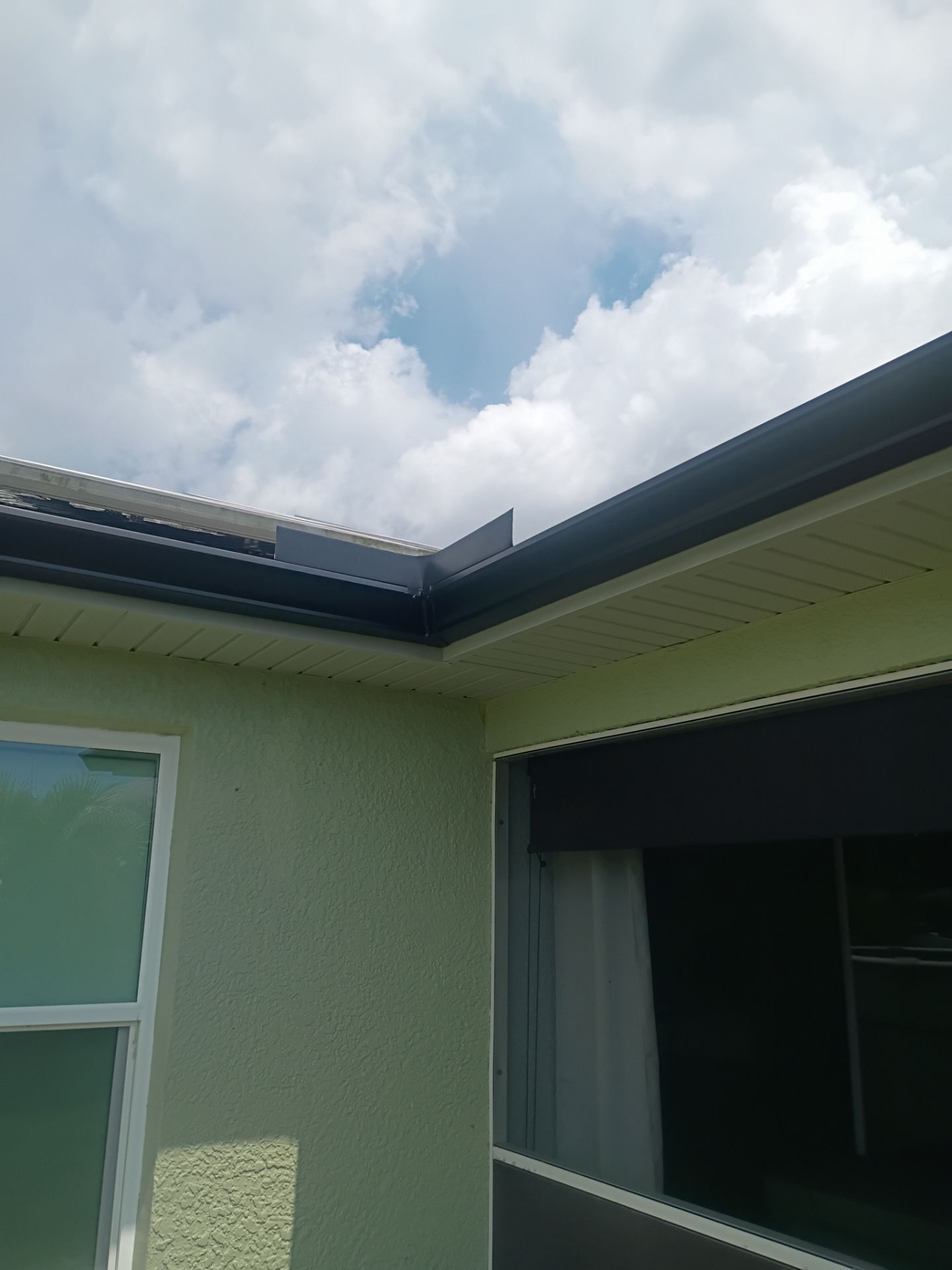 Black Seamless Gutters using K-Style Seamless Gutters in Cape Coral FL by Gutter Professors