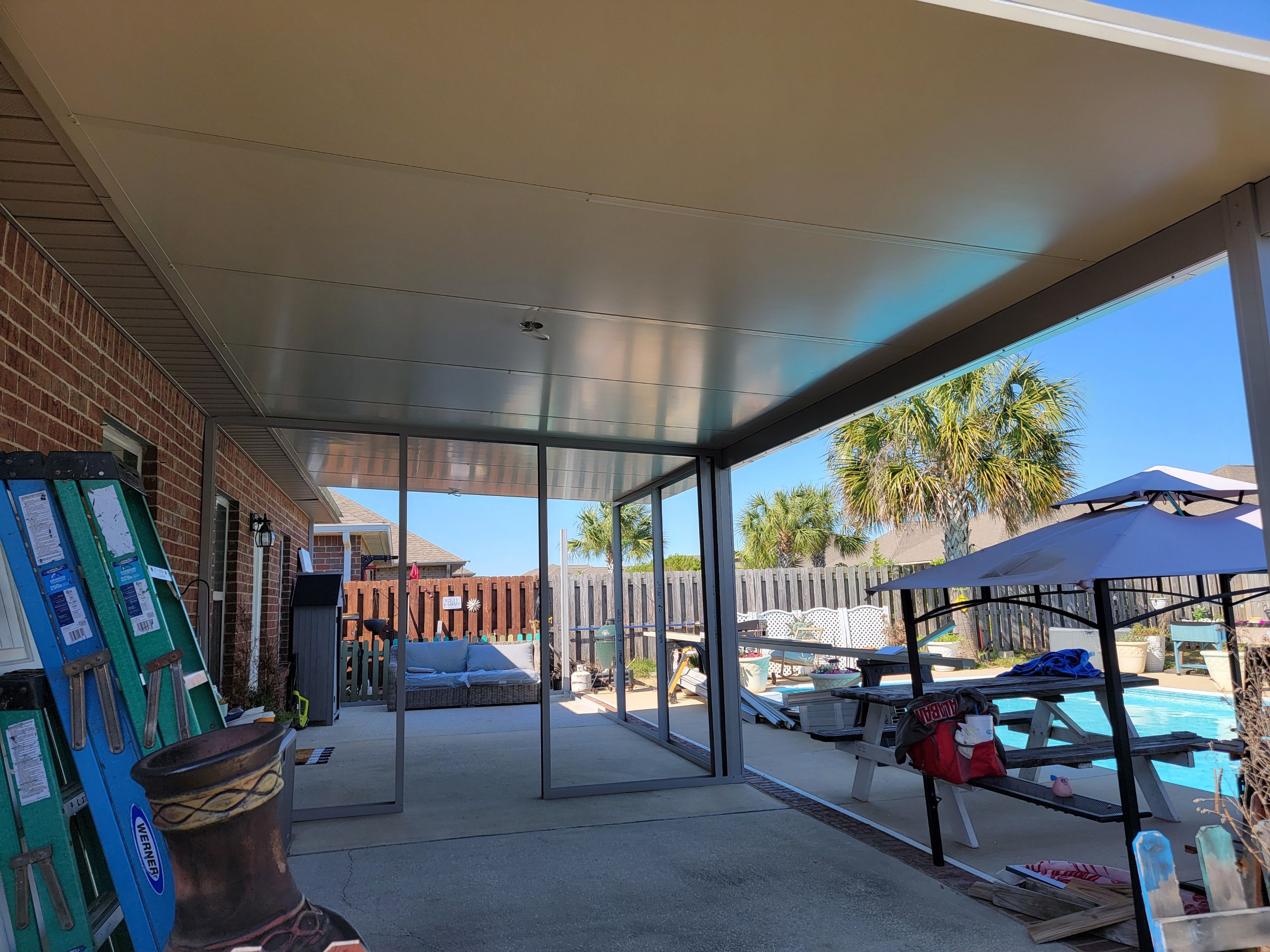 Poolside Screen Room & Patio Cover in Gulf Breeze by Titan Sunrooms