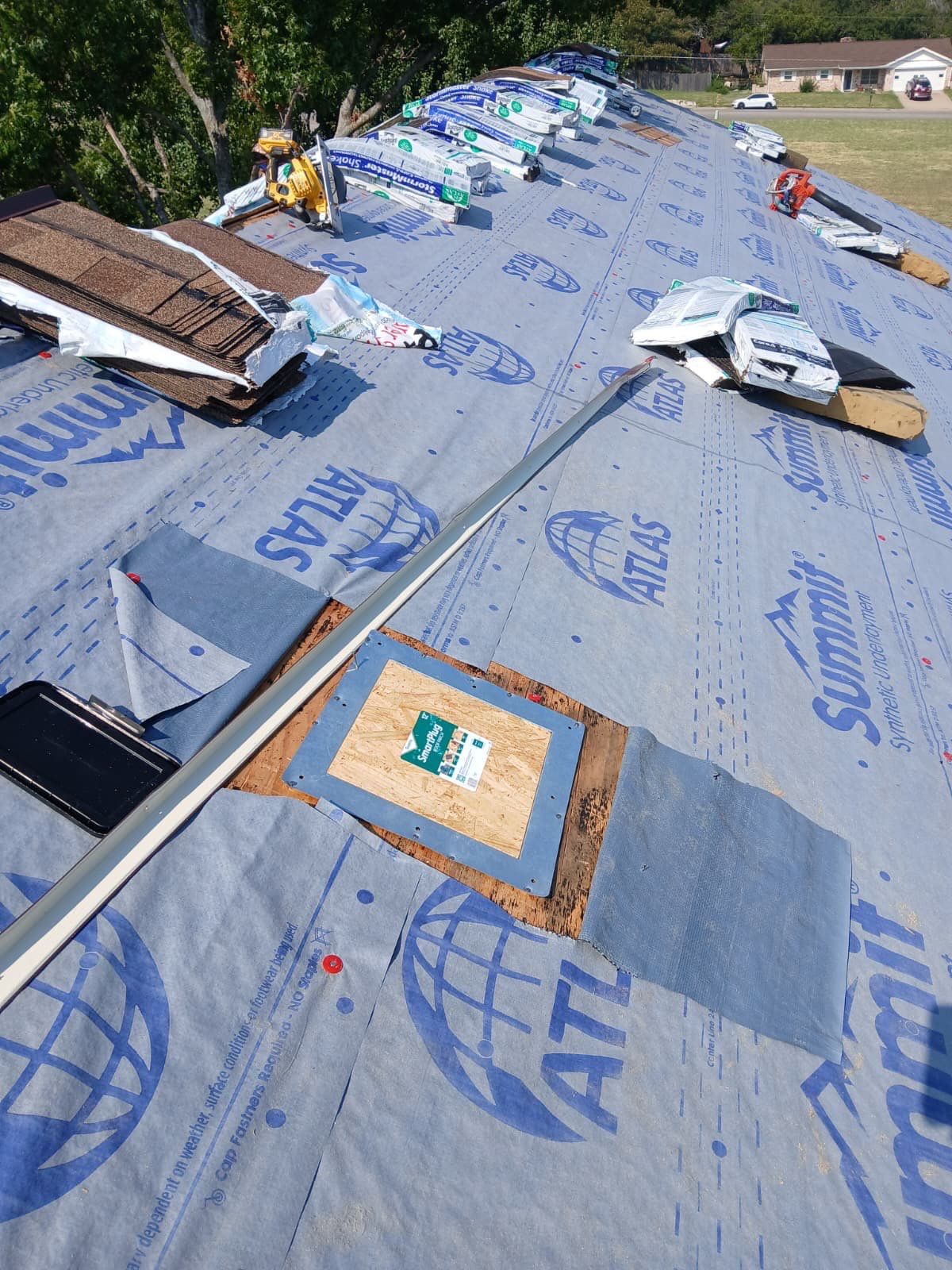 Commercial Roof Replacement using ATLAS StormMaster Shake by Harvey Roofing & Construction