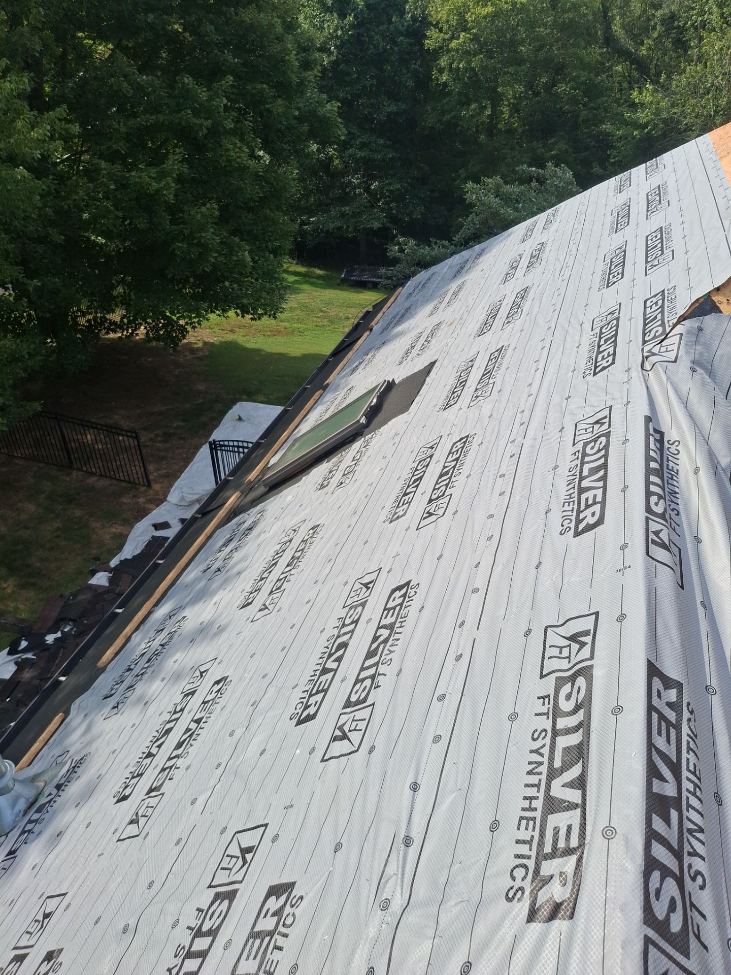 Residential Roofing Installation using GAF TImberline HDZ Hickory by Rainstoppers Roofing