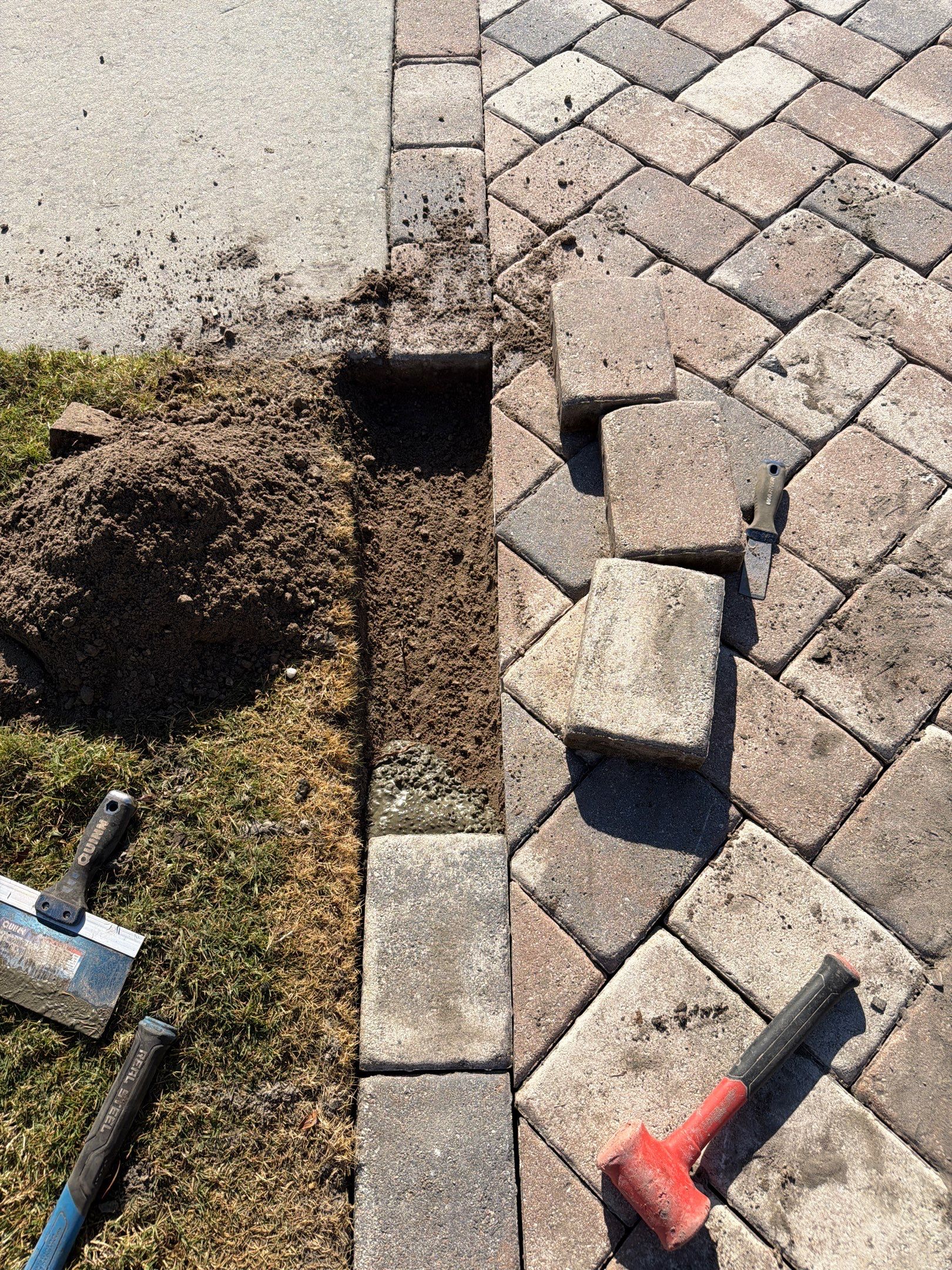 Herringbone Paver Driveway Repair, Stripping and Sealing in Sun City Center by Supreme Paver Experts