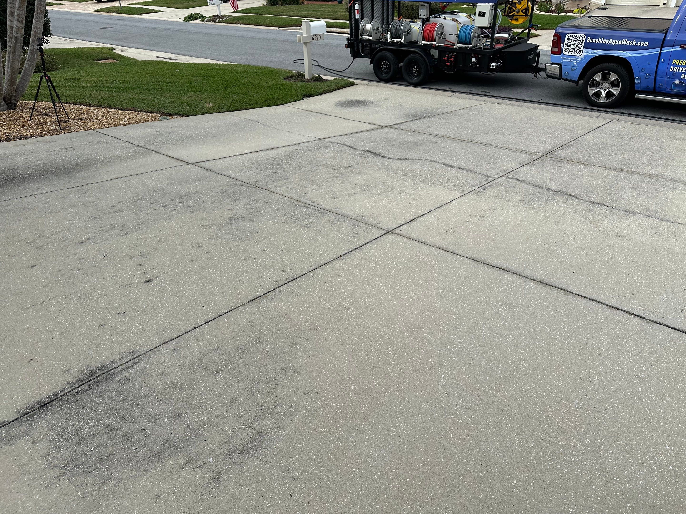 Concrete Driveway, Entryway & Street Curbing Cleaning in Fairways at Imperial Lakes, Palmetto, FL | Sunshine AquaWash by Sunshine AquaWash