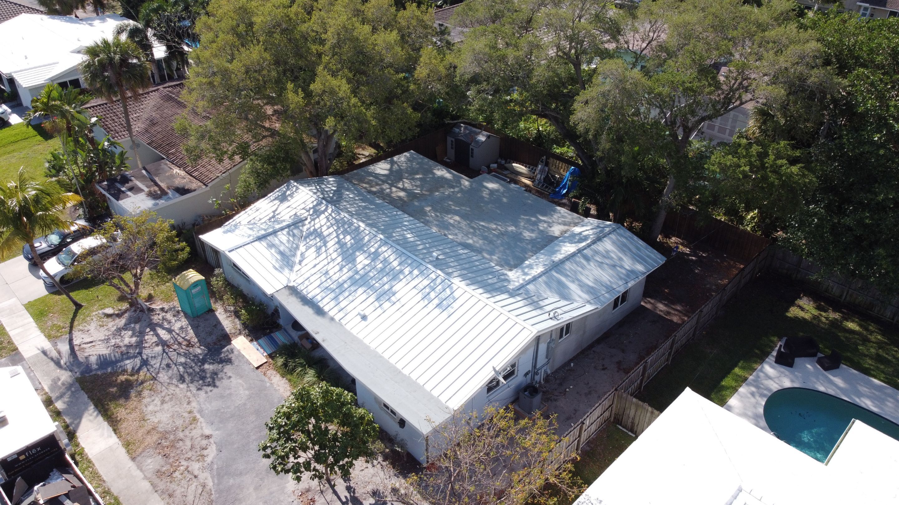 Residential Roofing Installation using 1.5'' Mechanical Seam by BLUES BROTHERS ROOFING