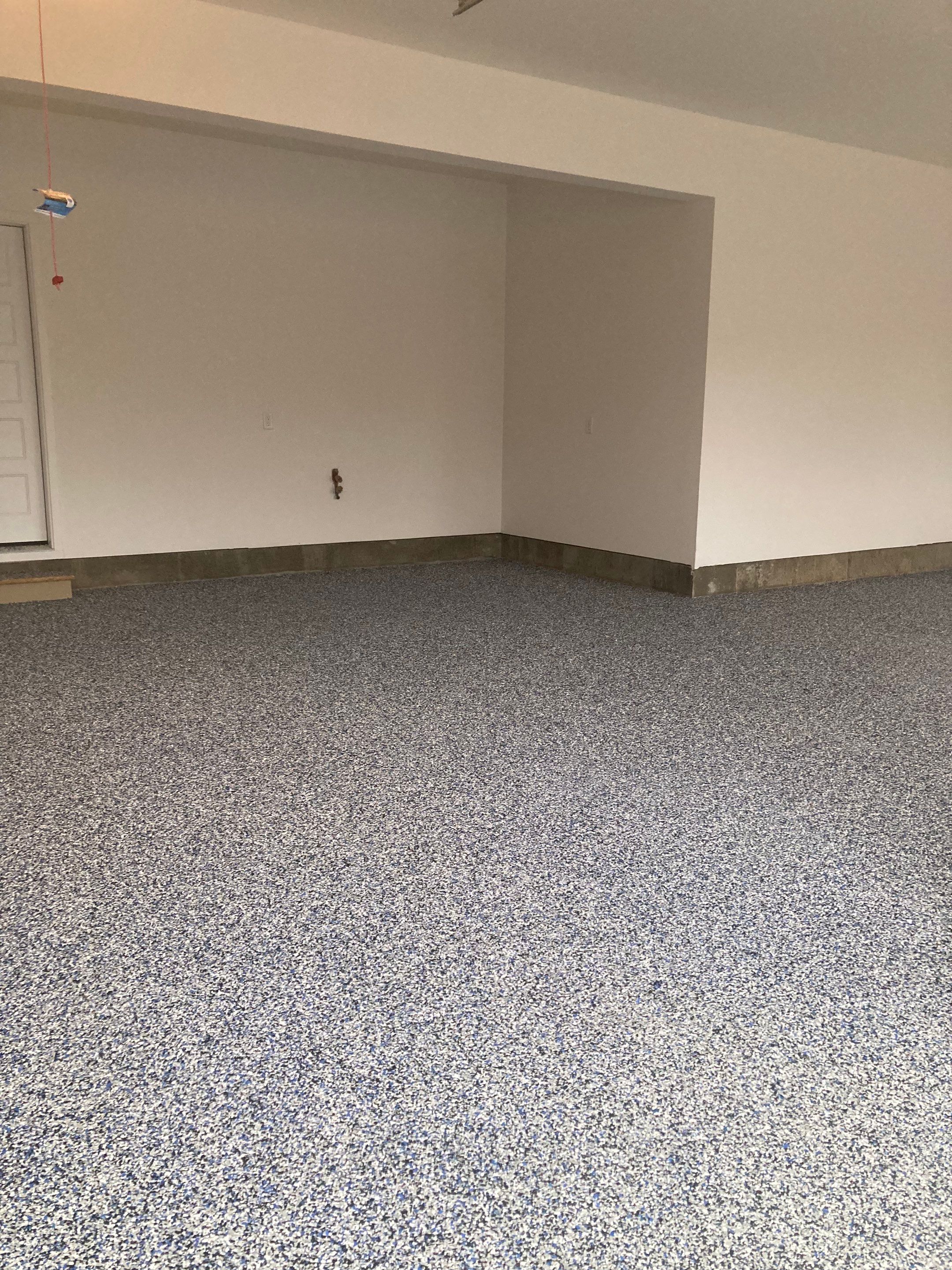 Garage Transformation using Domino with Blue by Croc Coatings, LLC
