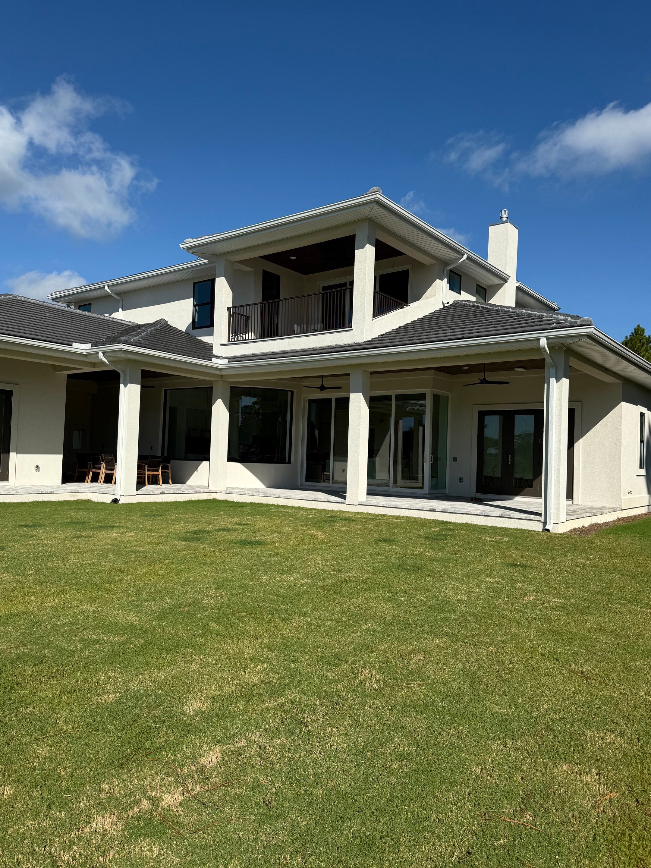 Motorized Screen and Solar Shade Installation in Panama City Beach by Brannan Aluminum Inc.