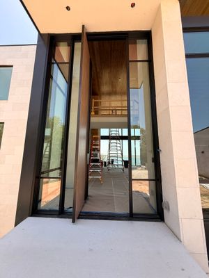 Custom Pivot Door and Structural Steel Frame Installation in Fort Worth