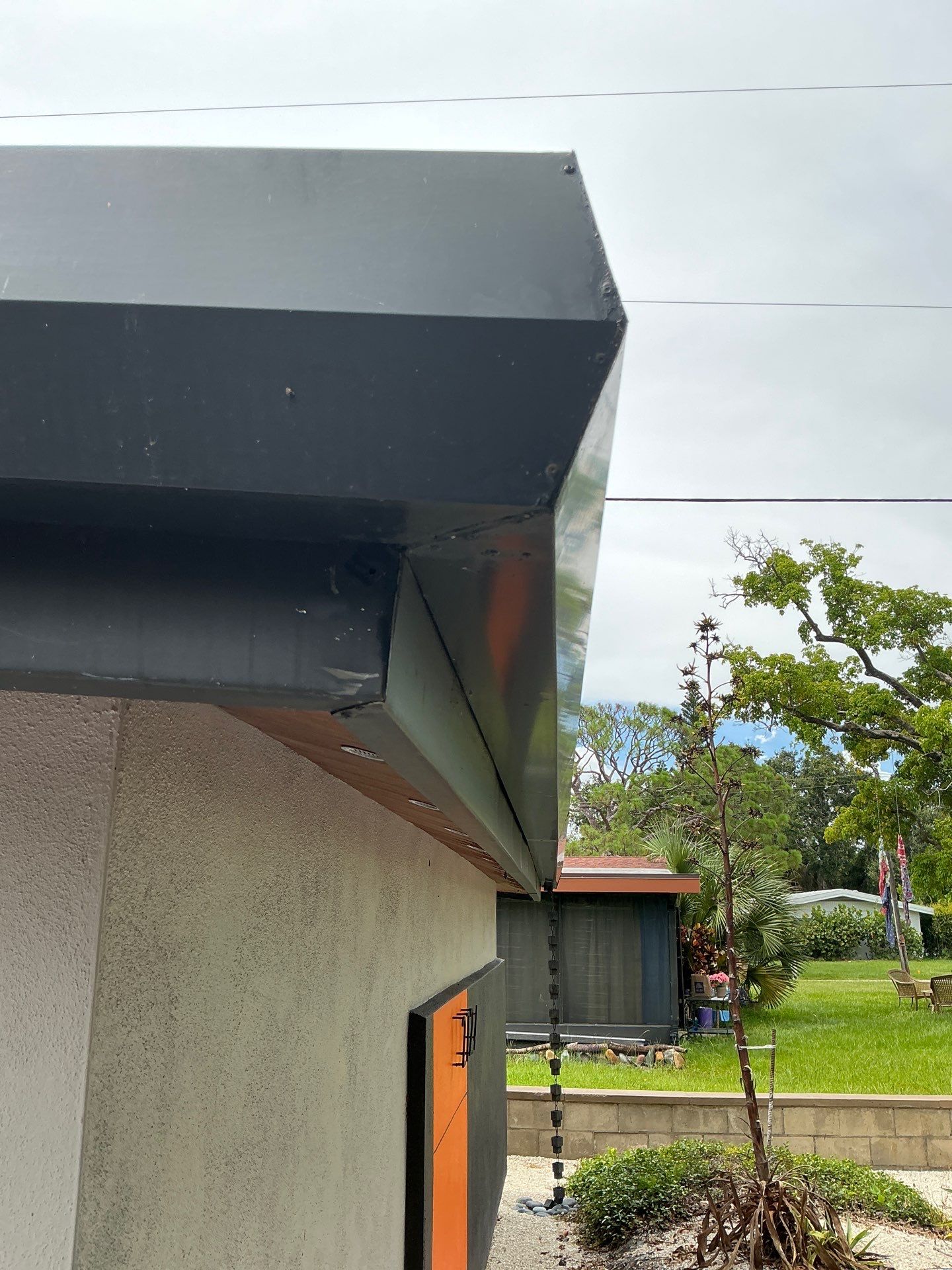 Black Seamless Gutters in Sarasota FL by Gutter Professors