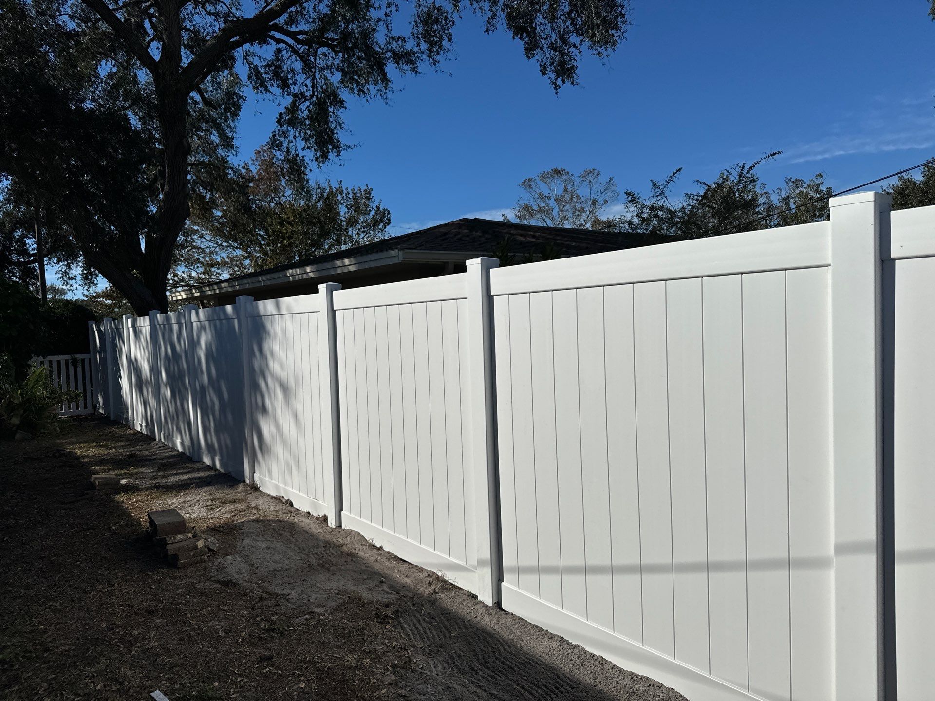Vinyl Fence Installation using 6Ft White Vinyl Fence with a 4Ft White Picket Fence by Asap fence and gates, LLC